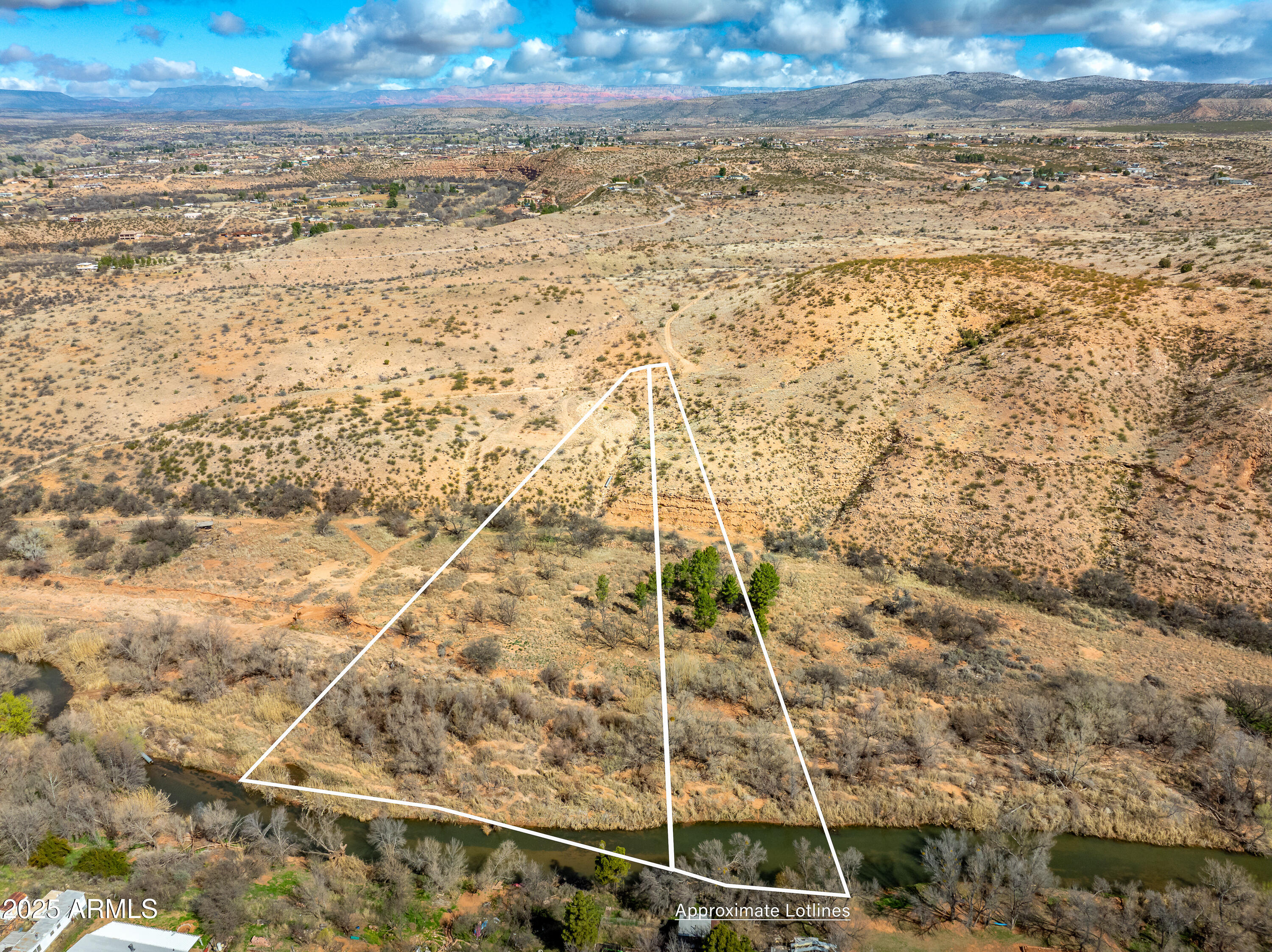 Rare opportunity to own acreage boarding Oak Creek.  This 6.74 acre lot is comprised of 2 conjoining lots, the smaller lot being 2.5 acres in size and the larger being 4.24 acres. The southern portion of the land boarders Oak Creek and has a locked access gate.  The northern portion of the land has Forrest Service Road access.  Both of these routes to the land are difficult to find with no experience.  Please call for directions and 4 wheel drive is recommended. Yavapai County Zoning is R1L-70 and the land can be subdivided into 4 total lots with each of the 4 lots being a minimum of 1.61 acres in size.  There is no HOA governing this land.  Great sunset views to the west over Mingus Mountian and numerous mature trees on the property. Flat building envelope on the north side of the lot. Different soil types are prevalent on this land.  The "top" or north side has flat areas consisting of some rock while the "lower" or south side is a healthy blend of sandy loam and clay soil to ensure a variety of gardening options and building methods.  Please call for directions and to discuss any questions. Gated access points are both locked and a combination code will be given to serious buyers. If you're looking for privacy, big views, creek frontage, and elbow room this may be your opportunity of a lifetime!