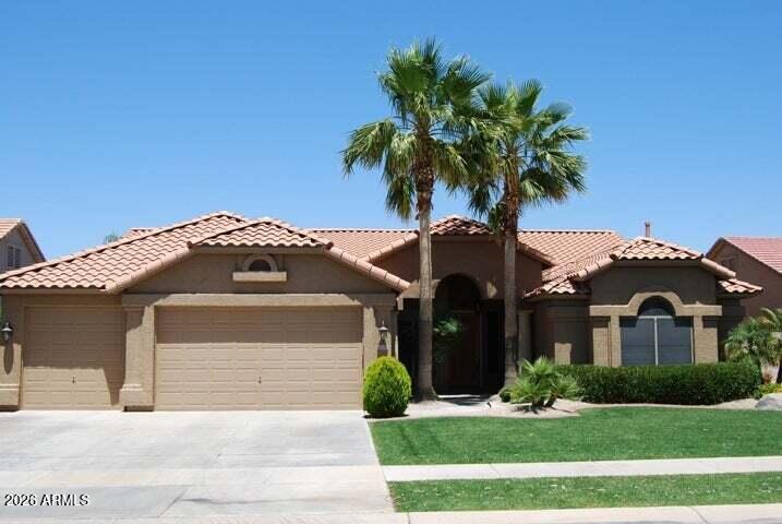 Don't miss this outstanding property! One of the nicest homes in the highly sought after lake/golf community of Ocotillo. This home has been meticulously cared for and updated beyond your expectations! This 4 bed 3 bath home includes a den/office/additional bedroom has a Gorgeous fully remodeled kitchen with top of the line cabinets, granite counters, 24'' travertine flooring and real hardwood floors. Primary bathroom is absolutely beautiful with a snail shell shower and huge walk in closet. Plantation shutters throughout. Exterior paint 2026. Private, manicured backyard complete with refreshing pool, mature landscape and north facing with no homes directly behind. Award winning school and shopping within walking distance.  New AC 2021