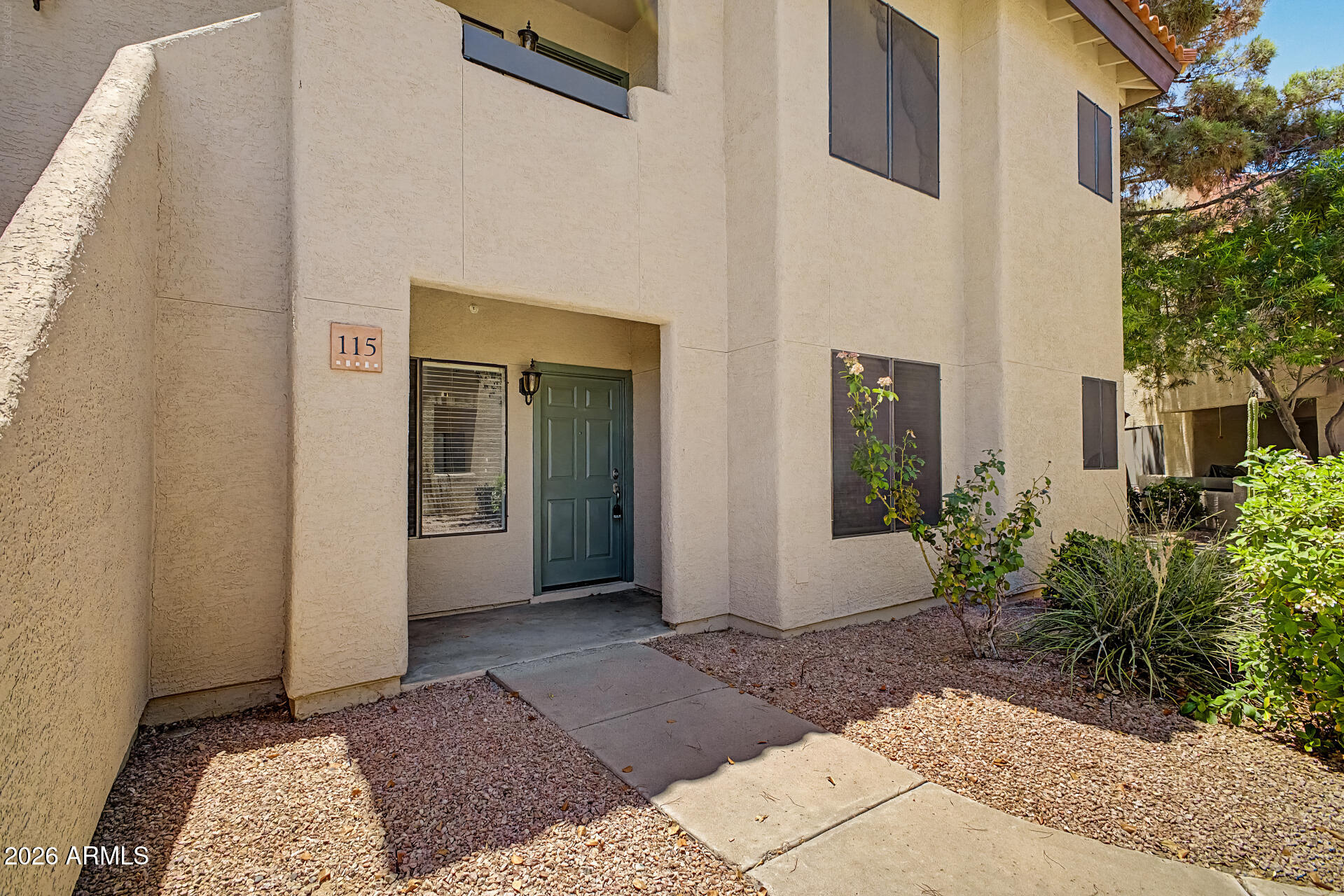 Enjoy owning this inviting ground-level 2-bed, 2-bath unit ready for you to move in! Fantastic floor plan! Featuring bamboo wood flooring, fresh paint, and ceiling fans throughout, Newer washer and dryer, creating a comfortable and welcoming atmosphere. The kitchen offers track lighting, stainless steel appliances, and plenty of cabinet space for easy organization. Retreat to the sizable primary bedroom, which provides plush carpet, a private bathroom with an enclosed glass shower, and a walk-in closet. PLUS! For added convenience, a washer and dryer are included. Relax and unwind under the covered patio after a busy day. Don't miss your chance to make this charming home yours! Hurry!