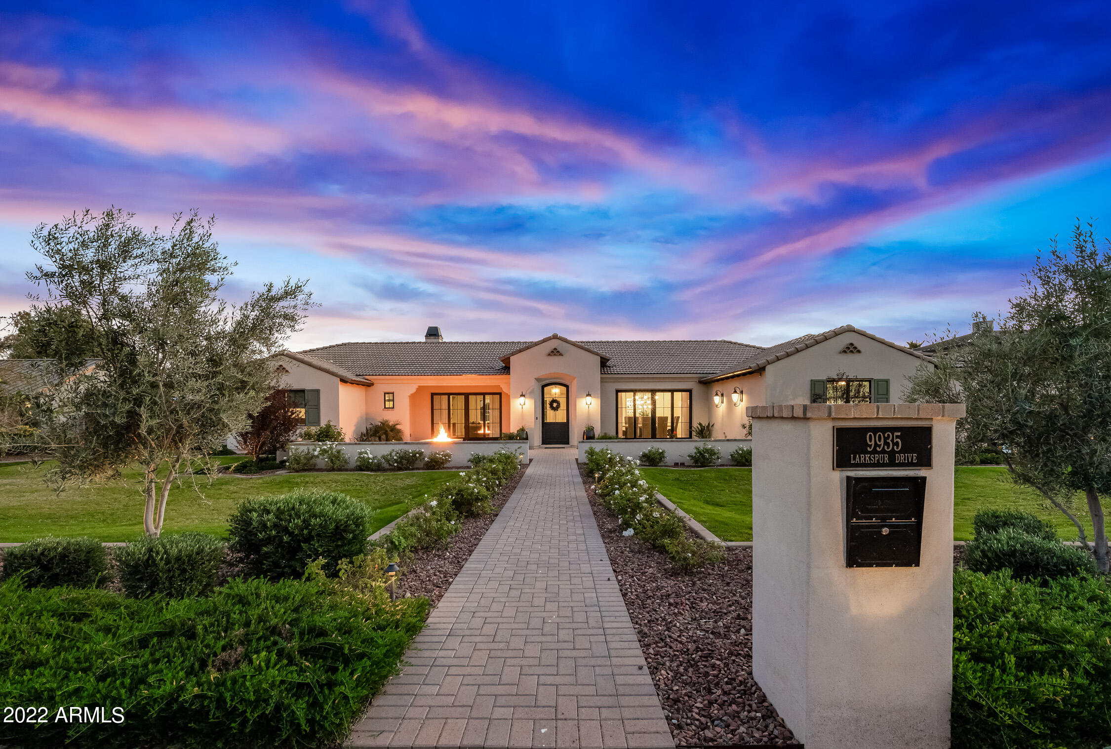 Fresh may be the best description for this stunning 2019 build by Encanta Homes, with design by Kent Architects and K&C Interiors. Not a rebuild or remodel, this home has been gently lived in by seasonal owners with exquisite taste paid to the final appointments. Resting on 1.1 landscaped acres in the Cactus Corridor,  this 5BR/6BA HOA-free property has a Coastal Contemporary feel with plentiful acreage remaining to add additional structures.  Generous windows & oversize sliders draw in the Arizona sunshine while transitioning to private outdoor living areas, all framed by custom designer window coverings . The open floorplan features clean lines & high ceilings, 8' doors add height & scale while creating a feeling of expansiveness throughout 5,100+ sq feet. The chef's kitchen will ... impress with an adjacent butlers panty offering a full height wine refrigerator. All bedrooms are ensuite with intricately tiled baths while the spacious master retreat offers a specialized closet with private laundry. Outdoors you will find a resort style fountain pool, live fire features and a large paver driveway that leads to a custom 4-car 1500+ sq ft garage. This home is fully automated & the epitome of what modern buyers are looking for. You will not leave this listing disappointed!