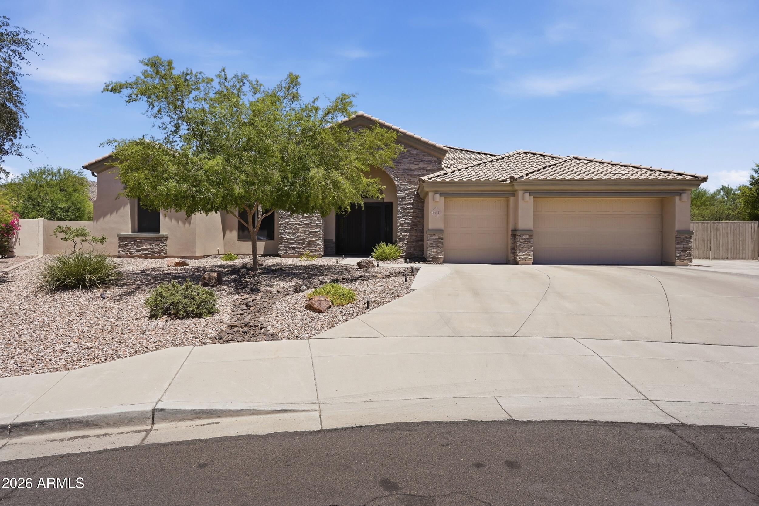 Soaring ceilings! Mountain views! Oversized lot! Paid solar! Tankless water heater! These are just a few features that make this home stand out from others in north Peoria. This unique, hard to find floorplan and oversized lot does not come to the market very often. Nestled in a cul-de-sac with friendly neighbors, serene surroudings, hiking and biking trails, and beautiful views, this home will not disappoint!  Plenty of room to build a guest house or RV garage!  The floor plan and outdoor space are perfect for entertaining, hosting parties, or just simply enjoying an evening at home.  Want more details?  Ask us!  One of us is a prior home owner in the cul-de-sac and couldn't say enough about this fantastic home, neighborhood and street!