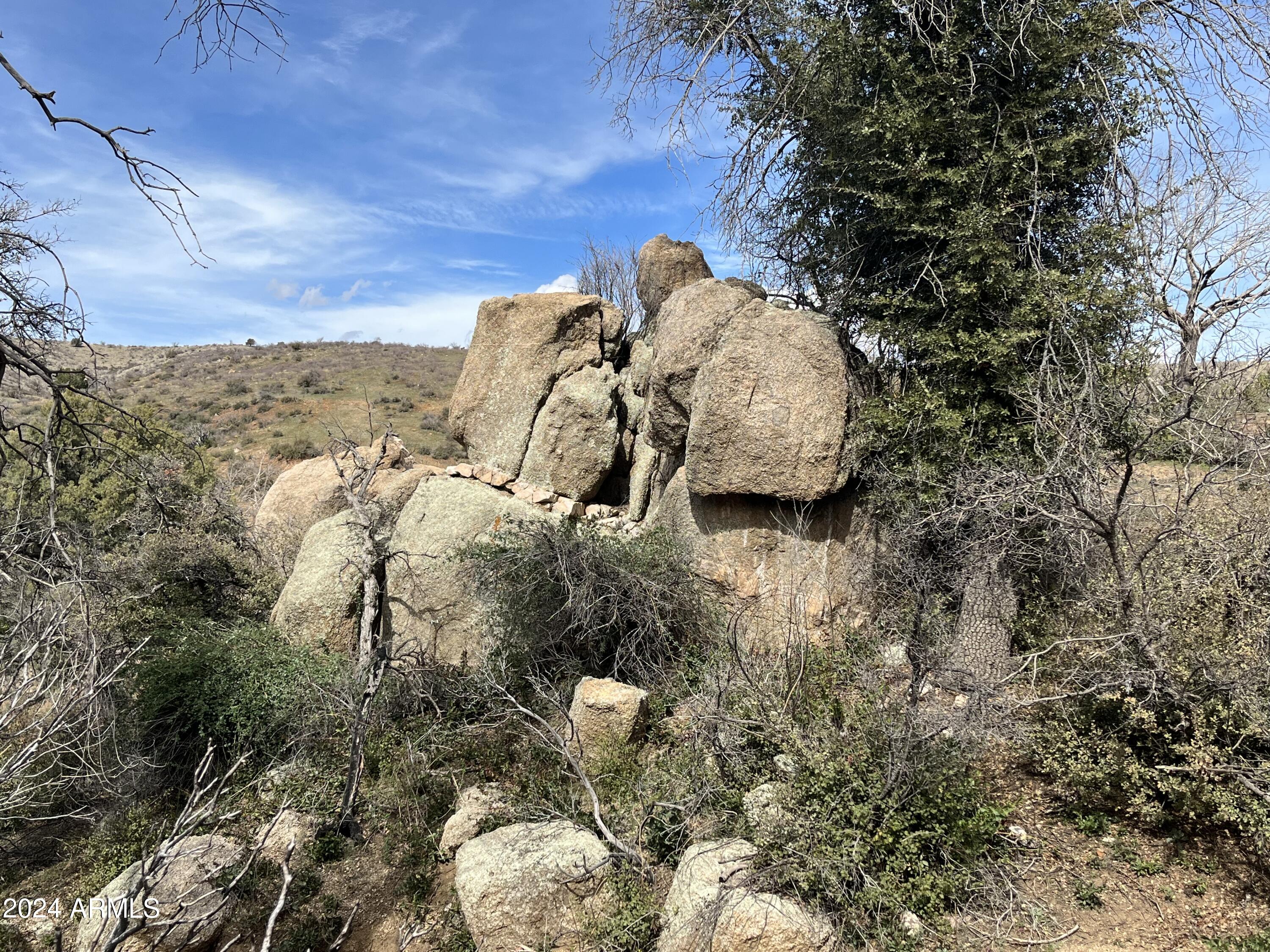 Beautiful land area with absolutely wonderful views.  Build a future home or use as farm land.  Fresh spring water on the property.  The parcel is part of the coming area that will gated ''Sycamore Springs''.  Buyer to verify all pertinent information.