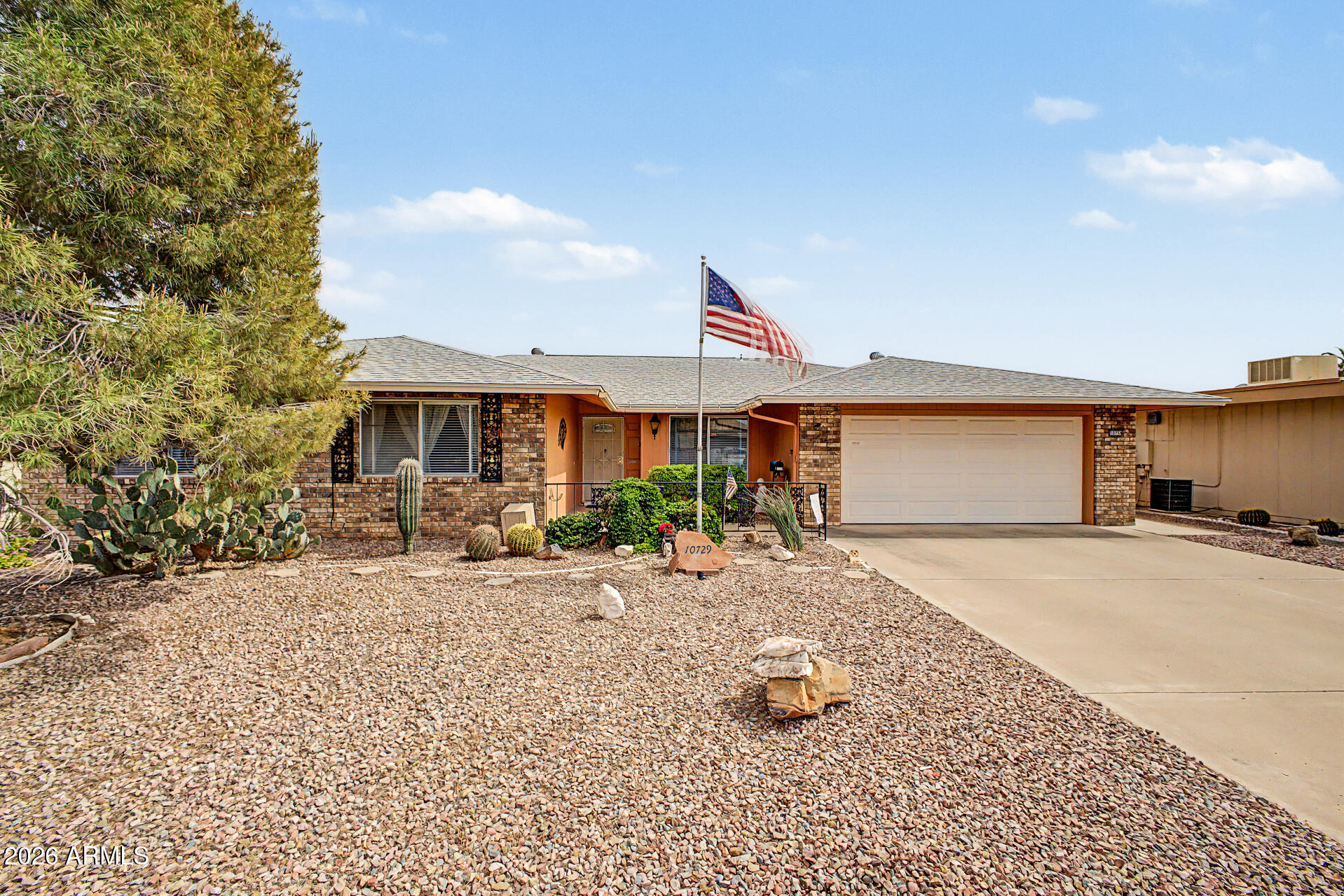 Check out this lovely 3 bed, 2 bath residence in Sun City, now for sale! Featuring tasteful brick veneers, a low-care desert landscape, and a 2 car garage, it's sure to be the one for you! Inside you will find a spacious dining & living area w/elegant wood-look flooring and neutral palette throughout. The galley kitchen comes equipped w/ample cabinetry, plenty of counter space, tile backsplash, all the built-in appliances you'll need for home cooking, and a breakfast nook. You'll love the primary suite, boasting soft carpet, a walk-in closet, private ensuite, and direct outdoor access. Also including a screened-in backyard patio, this home is simply a true gem! What are you waiting for? Act now!