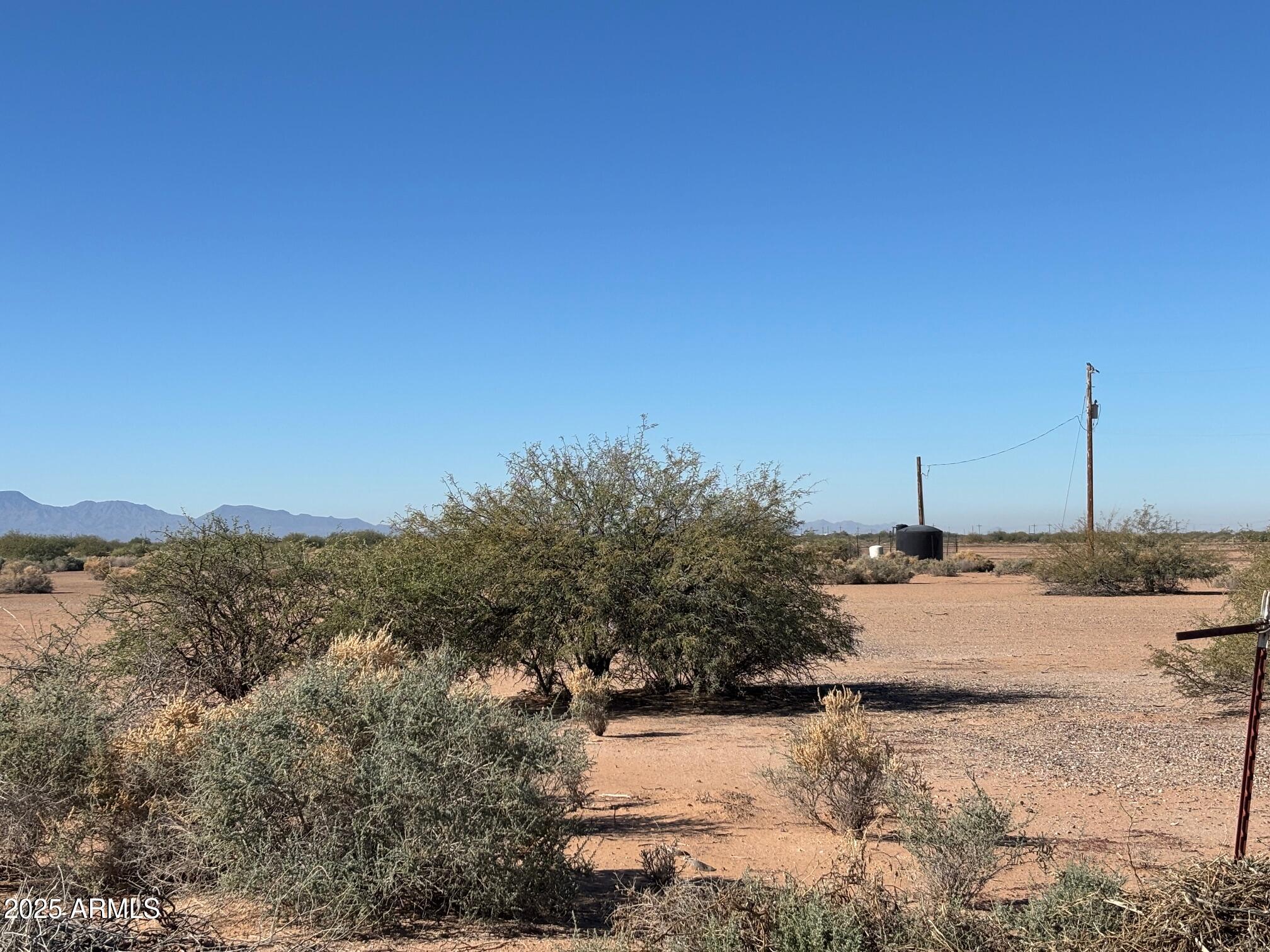 Just off a paved road, this 6.3 acre parcel of land has electric and a well on the property.  Need room for all your toys, this is the place for you.  Far enough out of the town for privacy but close enough to town if you need amenities.  A great location for your dream home with mountain views.  What a great investment opportunity.  Don't miss out on this one.