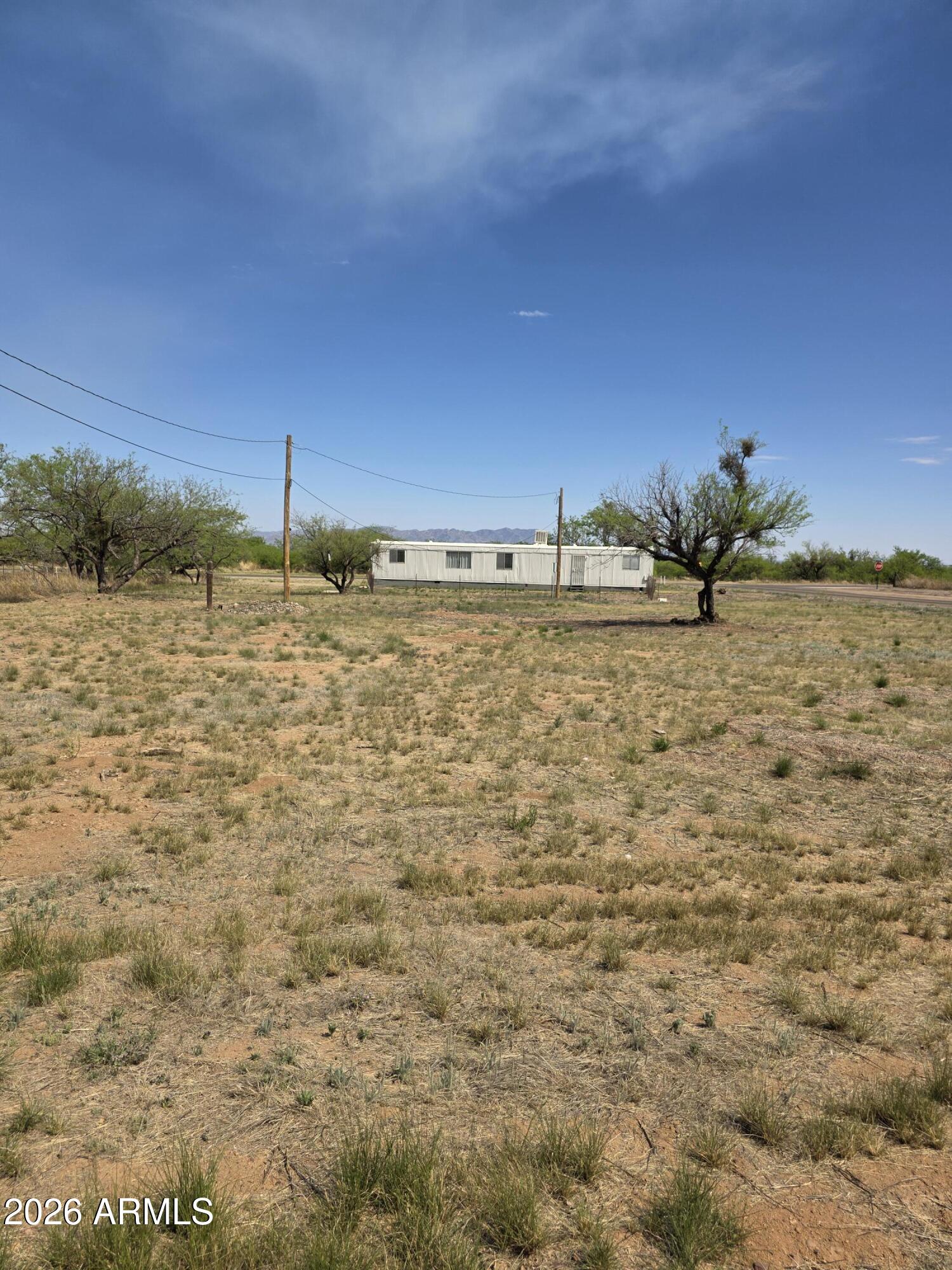 Bank REO!  Affixed MH, 3bed 2bath on large parcel, over 3/4 of an acre.  Corner lot, paved roads.  Home has updates from prior sale in 2023. Seller/Lender offers financing for MH on approval.
