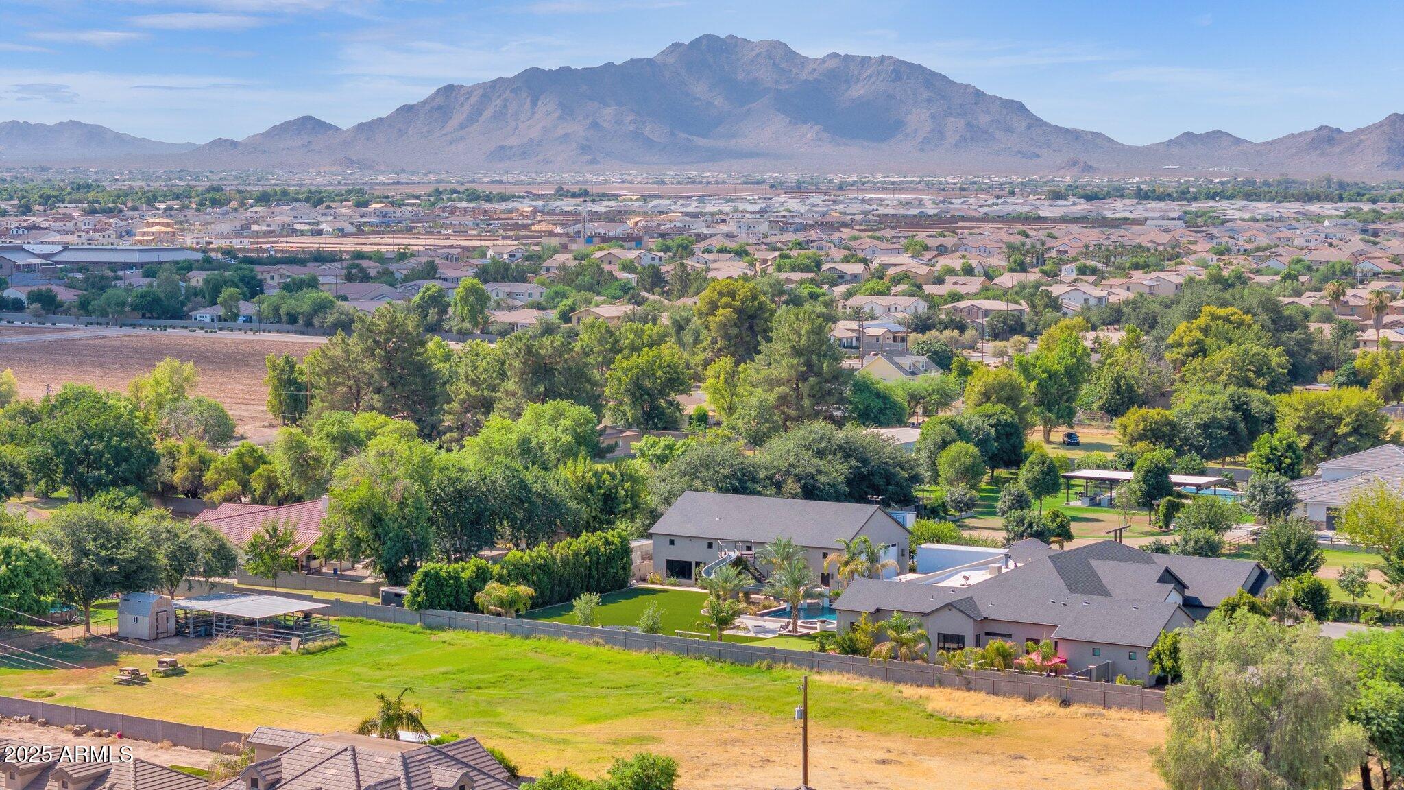 Here's your opportunity to own a full acre+ lot in the heart of Gilbert, AZ! This lot is perfectly positioned at the end of a paved cul-de-sac on an ultra-quiet street, offering privacy and peace while still being close to all of the conveniences that Gilbert has to offer. No duplicates — this is truly a one-of-a-kind property!

Key Features Include:
📏 Lot Size: 1 acre / 43,988 sq ft
🛣 Access: Paved street, end of cul-de-sac
🤫 Neighborhood: Super quiet, low traffic, private
⚡ Utilities: Available at street (buyer to verify)
🏡 Potential: Ideal for a luxury custom home build, guest house, RV garage, or shop
🏞 Views: Open skies, plenty of room for pool, gardens, or outdoor living
🚫 HOA: No restrictive HOA (buyer to confirm) Enjoy the best of both worlds with this rare Gilbert propertypeaceful and private, yet only minutes from local shops, dining, entertainment, and top-rated schools. It's an ideal opportunity to build your dream home today or hold as a smart investment for the future.

Buyer to conduct all due diligence regarding zoning, building regulations, and utility information.