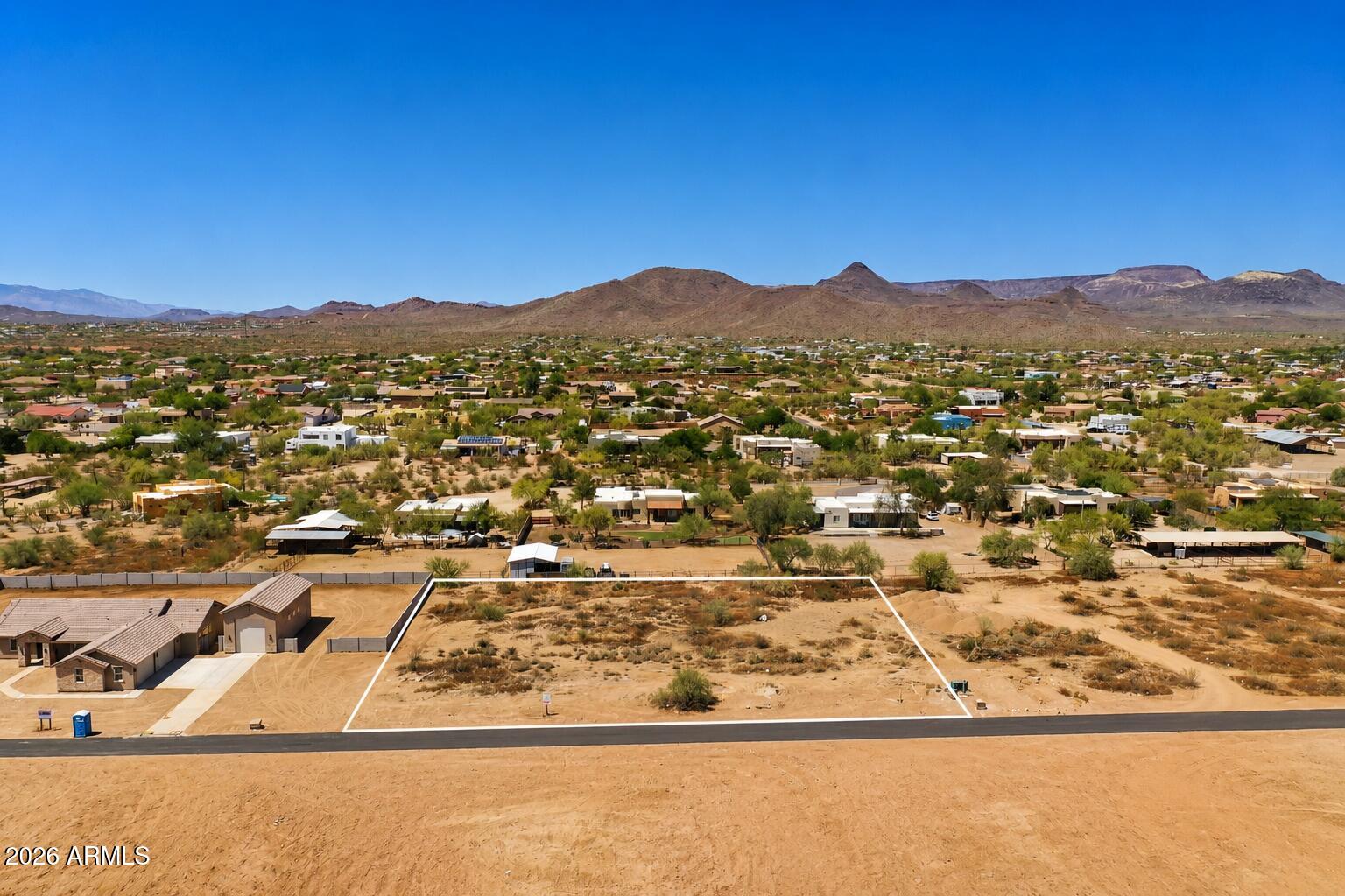 Come Build your dream home on this stunning 1-acre lot featuring breathtaking mountain and desert views. Nestled in a peaceful, secluded area, this flat, buildable lot offers ample space with no HOA restrictions, access to a brand new well for water, primary electric to the lot, & a brand new paved road for access. Enjoy the convenience of nearby amenities, including shopping, dining, and healthcare, while being moments from outdoor adventures and the historical town of Cave Creek. Horseback ride, hike, or bike on trails at Cave Creek Regional Park or neighboring paths. With easy access to the I-17 freeway and close proximity to Lake Pleasant, this property offers the perfect blend of tranquility and accessibility.