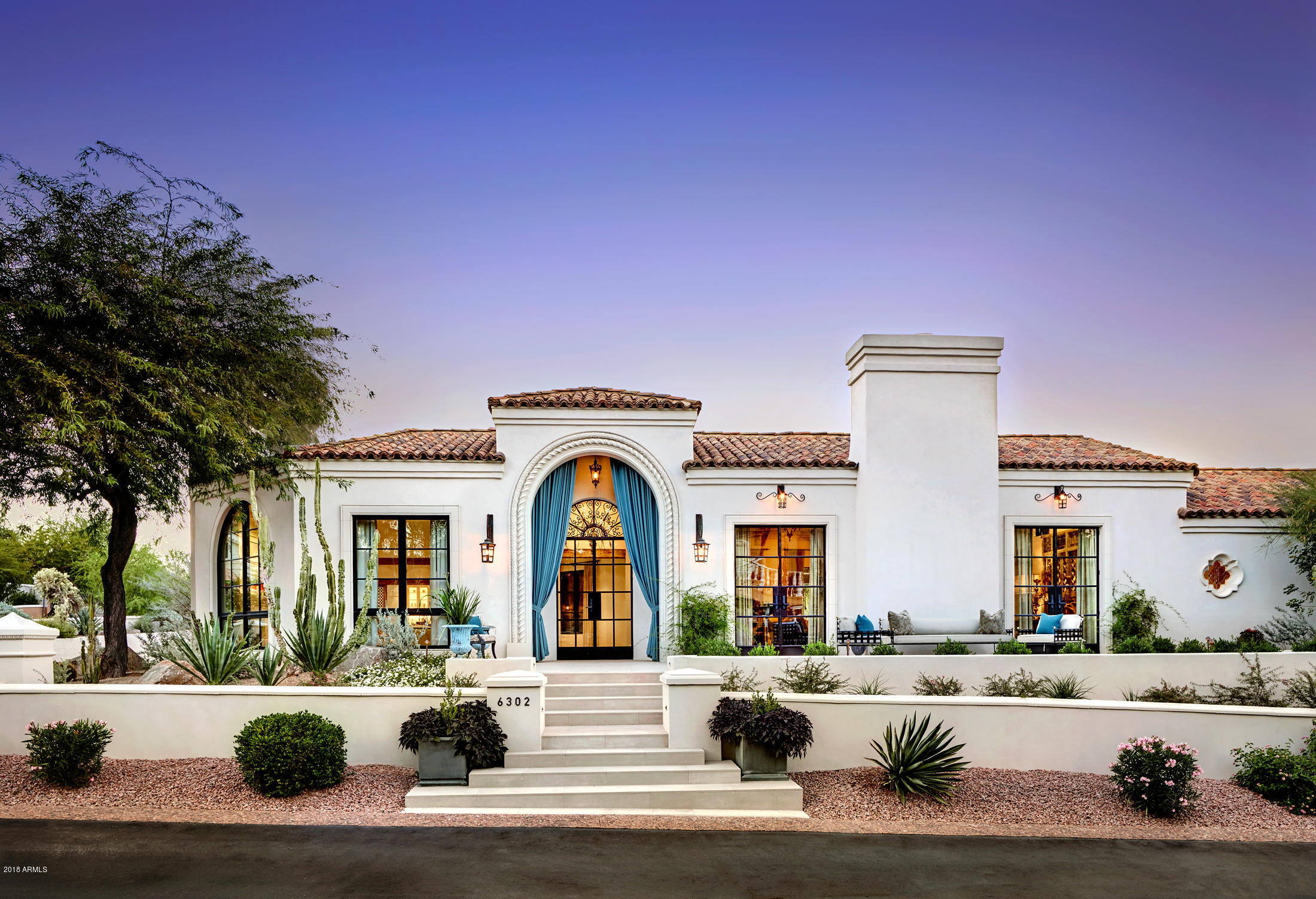 Privacy and Perfection in Paradise Valley Mountain Retreat...This home was the 2016 LUXE MAGAZINE GOLD STAR winner and featured in Decor Inspired Living and
Exceptional Design Magazine A complete remodeled home with architecture by Matt Thomas, built and designed by renowned Nance Construction and award-winning interior designer
Laurel Pfannensteil. It is a sophisticated blend of modern and Santa Barbara style architecture with fixtures and finishes sourced from all over the world. The 4629 Sq ft plan lives spaciously
with 365 degree views from the main living spaces. Each bedroom includes its own luxurious bathroom within each suite. This home is truly a classic and will stand the test of time.