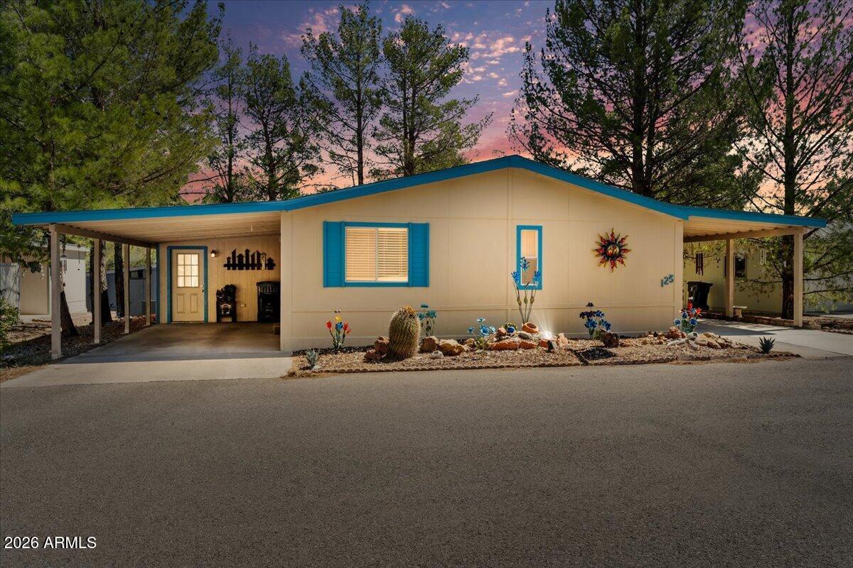 Enjoy easy living in this beautifully updated home located in a welcoming 55+ community just minutes from Old Town Cottonwood. With a functional layout and thoughtful upgrades throughout, this home offers comfort, convenience, and flexibility.
Step inside to a bright, refreshed interior featuring updated bathrooms, newer flooring in the kitchen, living room, laundry, and bonus room, along with updated lighting, ceiling fans, interior doors, and blinds. Fresh paint in the bedrooms adds to the clean, move-in-ready feel.
The kitchen is both practical and inviting, offering an electric oven/microwave, breakfast bar, and pendant lighting. A built-in laundry/office combo with desk and cabinetry adds everyday convenience.
See document tab for list of Upgrades and Improvements. A versatile bonus room provides the perfect space for a potential third bedroom, hobby room, or additional living area. In addition, a separate 12x12 storage room offers plenty of extra space for tools, seasonal items, or projects.

Enjoy the covered, screened patio--ideal for relaxing or entertaining year-round. Two carports provide a total of three covered parking spaces for you and your guests.

All of this in a vibrant community close to shopping, dining, and the charm of Old Town. Easy to show!