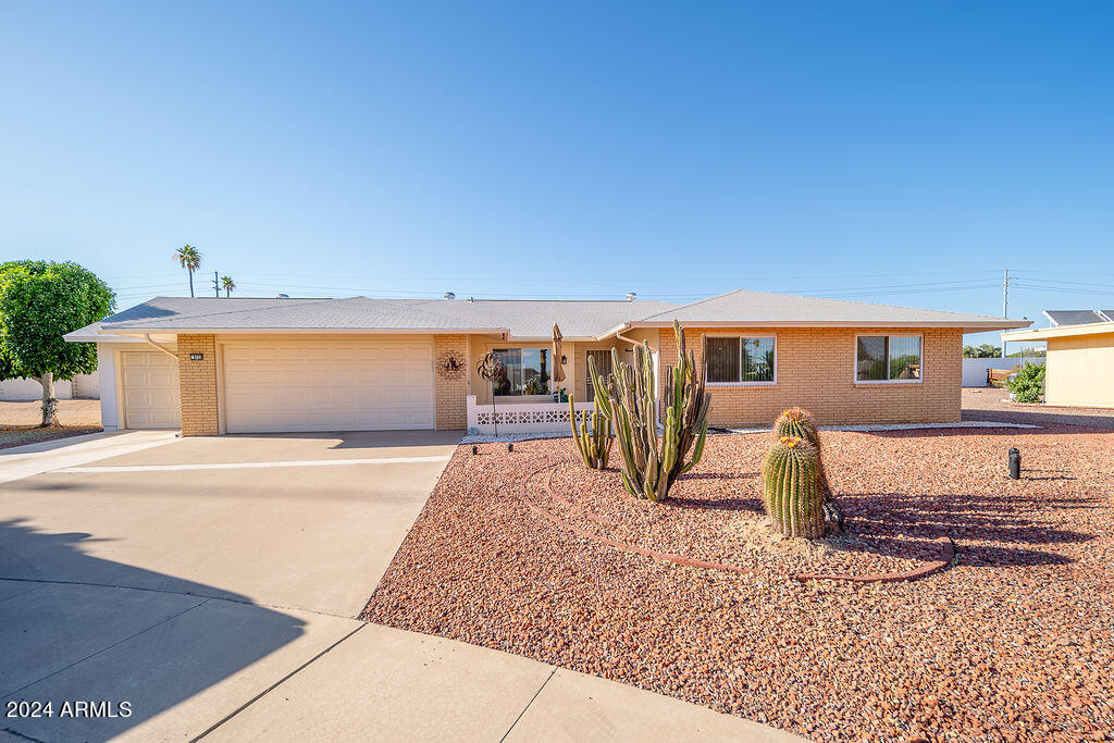 Searching for car enthusiasts! Rare find in Sun City with an 1169 sq foot permitted addition offering multiple versatile opportunities! Could be living quarters as there is a full bathroom added, could be a workshop or could hold 6 cars or toys whichever fits your needs! There are very few homes in Sun City who offer this kind of space! New sewer lines installed to ensure capacity for the addition. The original two car garage has just been painted! This cul-de-sac lot offers an expansive backyard! The main home is thoughtfully outfitted with triple pane windows, ensuring superior insulation against both sound and heat. Noteworthy recent upgrades include a new AC unit and water heater installed in 2021, The oven and stove top were replaced in 2018. New kitchen counters insalled 2026! Maintenance and improvements extend to the infrastructure, with sewer lines and clean outs updated during the 2017 addition. The exterior features a freshly painted back wall, benefiting from a five-year warranty, with two years remaining. . The roof was replaced in 2018, with insurance coverage through AAA.

To accommodate discerning buyers, seller financing terms may be considered.