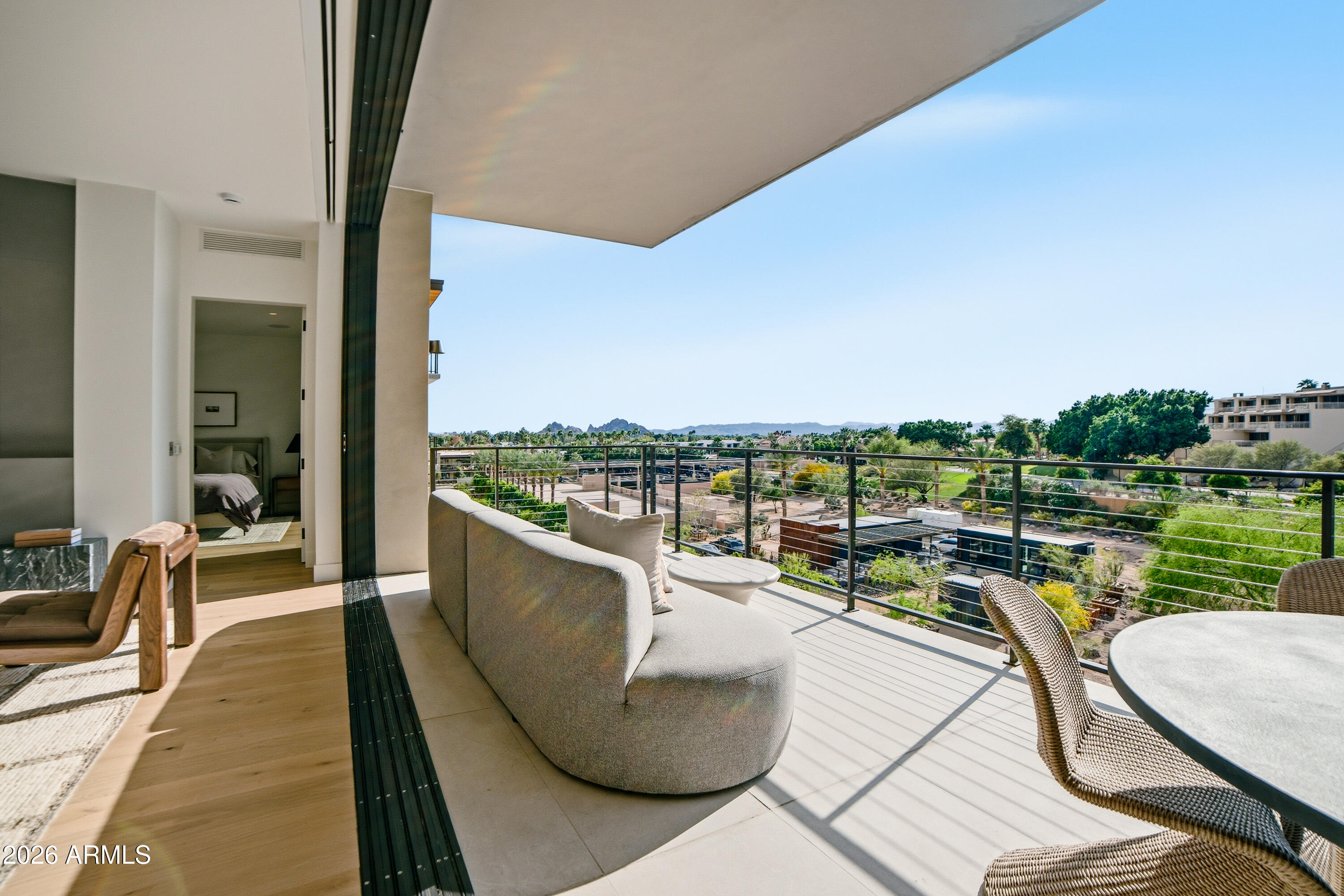 Tucked at the base of revered Camelback Mountain, Ascent is a new, private residential enclave adjacent to The Phoenician Resort - one of Arizona's premier luxury resort destination. This community incorporates the Sonoran Desert landscape directly into its design, at the most enviable location in Scottsdale. Ascent offer views overlooking the Valley & Camelback Mountain. Home designs feature contemporary architecture integrating warm, natural materials, expansive windows, and large outdoor patios. Thoughtfully designed by Nelsen Architects and Vallone Interior Design. Luxury finishes include exquisite Bulthaup Kitchens, Provenza wood floors, Sub Zero Wolf appliances & 10' ceilings.