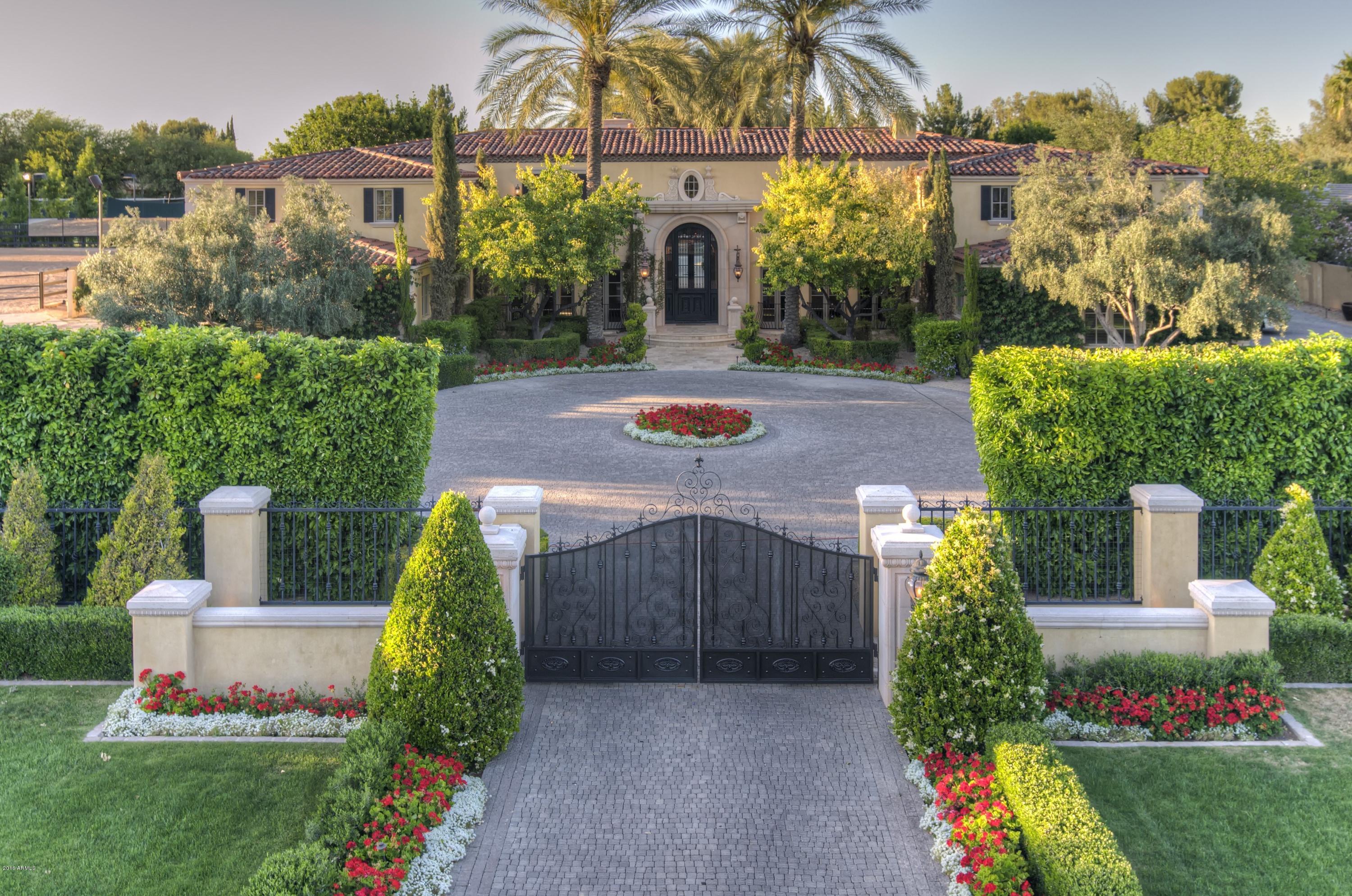 Nearly three acres.  This sophisticated Santa Barbara estate by acclaimed builder Cal Christiansen and renowned architect Mark Candelaria is sure to delight and impress. Gated, private, manicured w/circle drive, garages for six cars. Stunning entry w/soaring ceiling, arches, groin vaults open a visual corridor through a magnificent living room through French doors to a lovely garden. Views continue from the front door to a  captivating pool, spa, gazebo, bar, fireplace, fountains, and water slide. One acre could be split off + sold somewhere in the 900's retaining nearly two acres. Price would be under $4,500,00. Stone and wood floors throughout with four fireplaces inside, one out plus fire pit. Six bedrooms w/ensuite baths and walk-in closets. Romantic Master with fireplace has adjoining den.  Master bath has his/her water closets, three spacious closets plus a hidden extra. Office has 1/2 bath, game room w/bar, 1/2 bath, adjoining poker room or den. The exquisitely appointed kitchen boasts two pantries and an office. For family pleasure find a batting cage, baseball and football field, tether ball, and trampoline. Professional horse setup includes five stalls with comfort padding, tack room, paddock for each stall, hot walker, training arena, grandstand, barn office/laundry/bathroom and large riding arena with mirrors. Timeless glamour meets warmth and charm in this private, one-of-a-kind residence with infinite entertaining possibilities.   Not counted in footage is a separate 3000 sq. ft. home which offers 3 bedrooms, 2 baths, plus a separate entry into a 1 bedroom 1 bath apartment designed to serve as a guest house, rancher's quarters, or caretaker's home.    For a luxurious family compound this property invites five star resort comparisons.  Seller will split off lot and keep it if buyer wants. Property enrolled in Greystone SmartStartÂ© Program. Both Buyer and Seller will receive a 50% savings on the Escrow Fee if the escrow is closed with Greystone SmartStartÂ© Program.