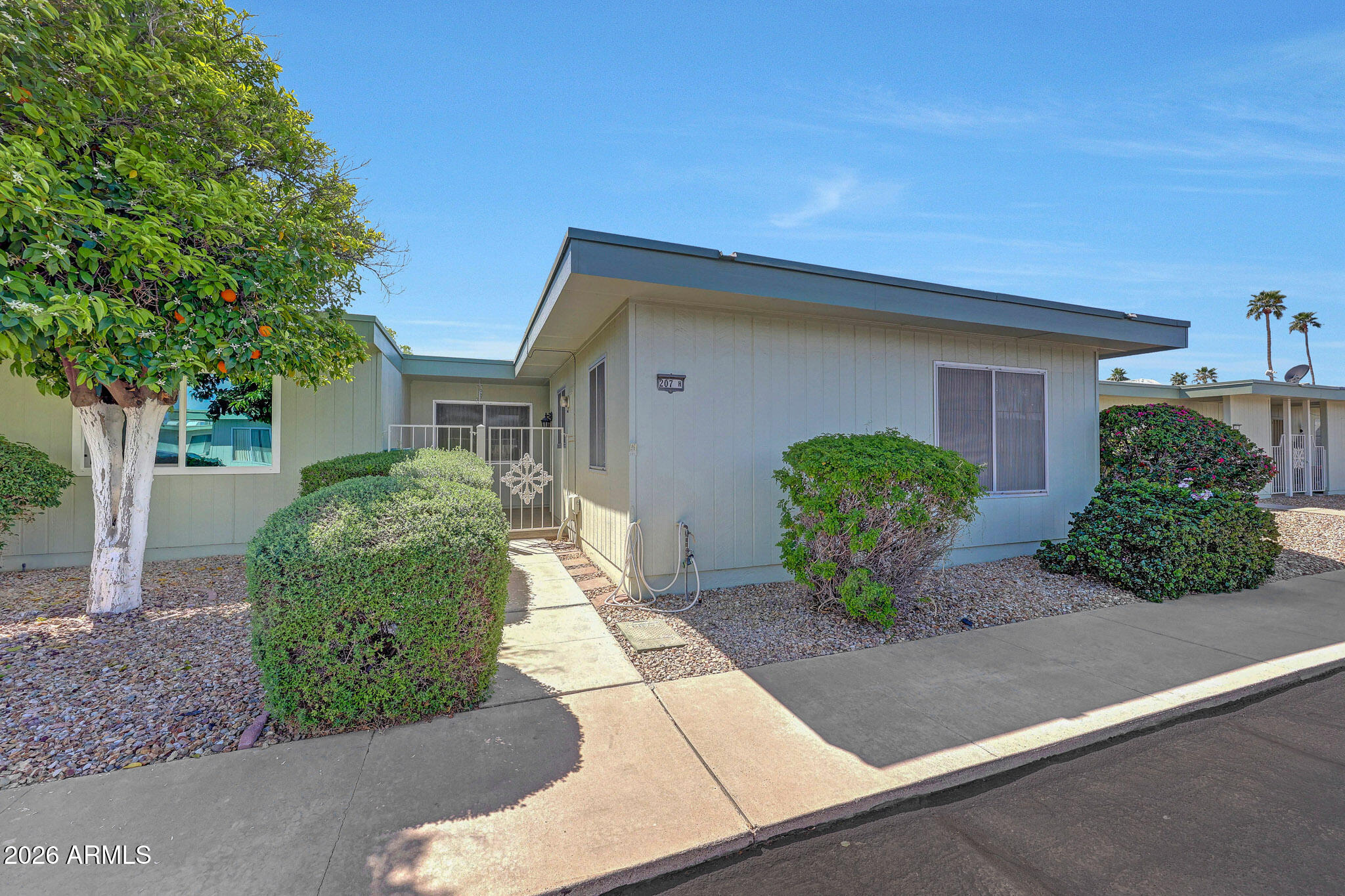 This CH2 Model Efficiency Home In Sun City Is A Great Option For Someone Looking For A Spacious, Move-In Ready Home! The Fresh Paint And Updated Flooring In The Guest Bedroom And Bathroom Give It A Clean, Updated Look. With A Galley Kitchen Offering Plenty Of Countertop And Cabinet Space, As Well As A Large Living Room And Roomy Bedrooms, It Is Definitely A Comfortable Place To Live. Access To A Shared Laundry Just Steps Away Makes This Home Even More Convenient. This Is A Must See Home. Please Stop By And See It Soon!