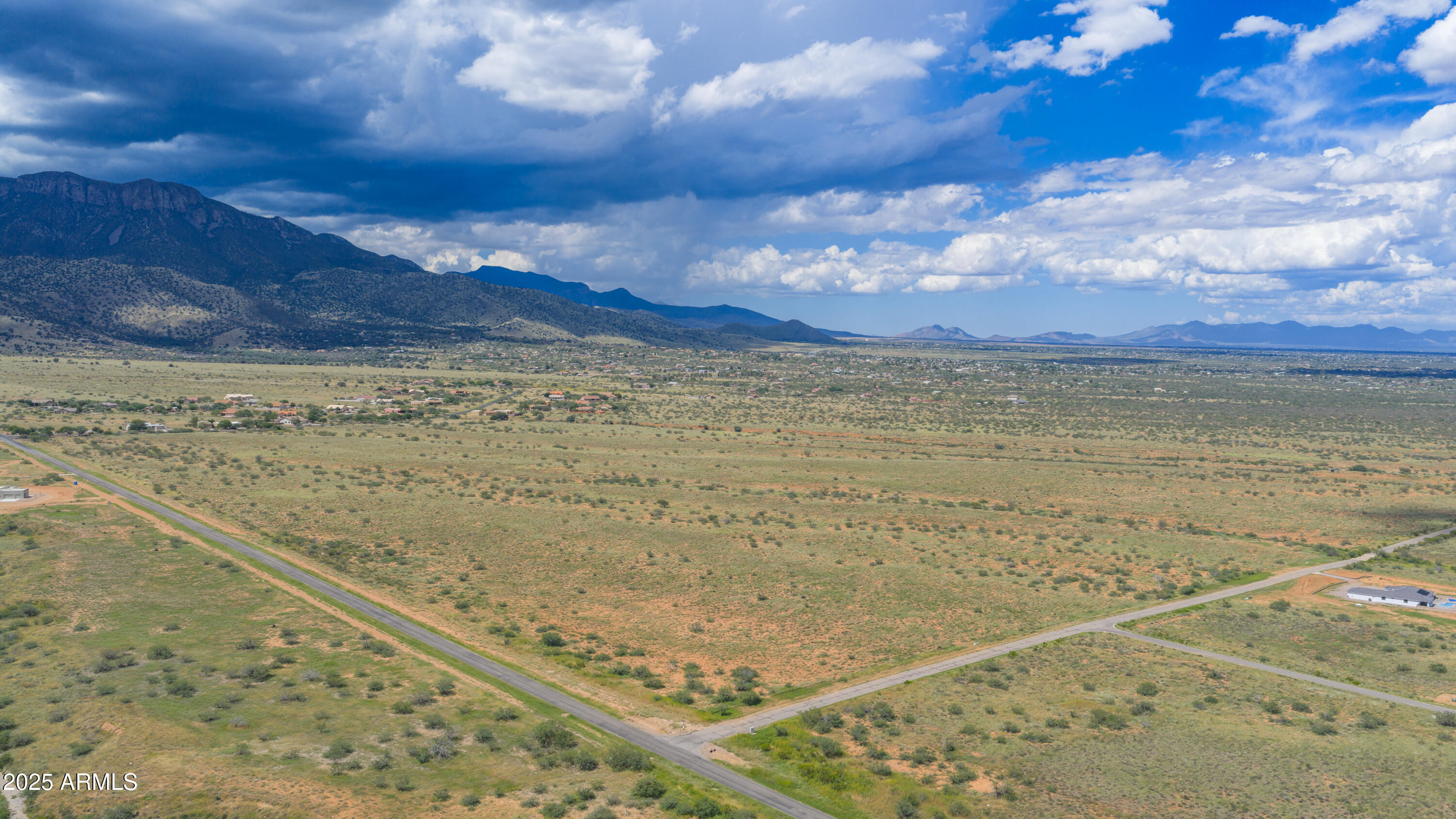 Spectacular 317.45 acre property with breathtaking views of the Huachuca Mountains! Surrounded by exquisite custom homes in the exclusive Wild Horse gated community in Hereford, the possibilities here are endless. Must see!