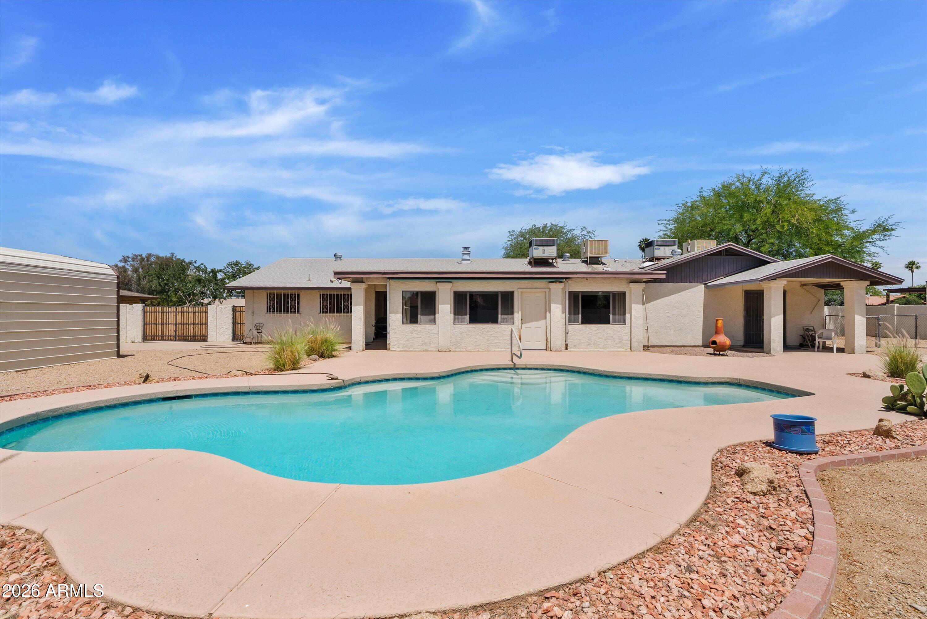 Grab it before it's gone! This well-maintained 3 bed, 2 bath, 2,532 sq ft home is full of original charm and sits on nearly half an acre with no HOA. Enjoy the flexibility of space and a beautifully kept neighborhood without added restrictions. The expansive backyard features a sparkling pool--one of the biggest investments already complete--and endless potential for outdoor living. A bright sunroom offers the perfect spot to relax and enjoy Arizona's weather year-round. Bring all your toys with plenty of room and a large RV carport for storage and hobbies. Conveniently located near State Farm Stadium, Arrowhead Towne Center, and just 1 mile from the Loop 101, with dining, shopping, and entertainment close by. Grab it before it's gone this well maintained 3 bedroom, 2 bath 2,532 sq ft home is full of original charm and ready to welcome its next owner. Situated on nearly half an acre with no HOA, this property offers the rare combination of space, flexibility, and a beautifully kept neighborhood feel without the added restrictions.

Step outside and discover endless potential in the expansive backyard, complete with a sparkling pool already in place one of the biggest investments, already checked off your list. A bright sunroom off the rear of the home creates the perfect space to enjoy Arizona's beautiful weather year round.

Bring all your toys this property is built for it. With ample space and a large RV carport, you'll never run out of room for storage, hobbies, or outdoor living.

Conveniently located near State Farm Stadium and just minutes from Arrowhead Towne Center, you'll have premier dining, shopping, and entertainment right at your fingertips. Just a mile from the 101 Loop!

This is the kind of property that offers both lifestyle and opportunity don't miss your chance to make it yours.
