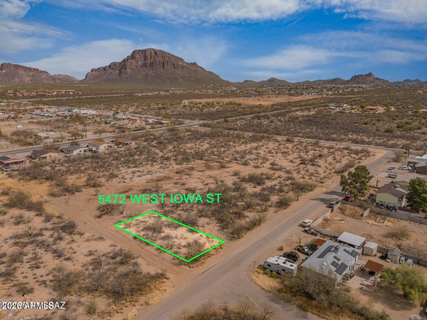This property consists of five separate parcels which can be sold individually or as a package. The land is perfect for creating a residential community. Zoned CR3 (small site-built homes) and CB2, each lot ranges from 7,300 to 7,550 square feet. Water service is available, though it runs along Sheridan and Sunset. Developers will need to cover the cost of extending water pipes from Iowa and installing meters. Excellent development opportunity!