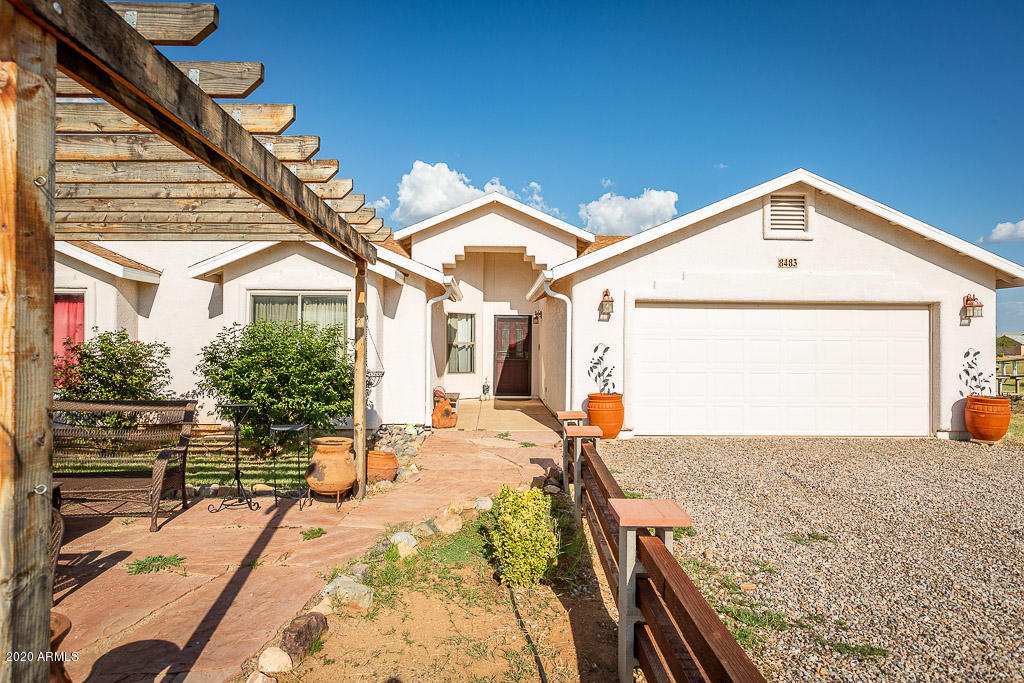 Enjoy country living with panoramic  mountain views in this 3+ bedroom on a four acre lot!  Relax under the pergola at the front of the house, or on the covered patio in the back.  Enter the living room to find beautiful detailing, with plant shelves, arched entryways, and plenty of light.  Open kitchen plan features granite countertops and plenty of storage space! Den with double doors could be used as a fourth bedroom, if desired.  Large sunken tub with jets, and double sinks in the master bath.  Come tour your future Home Sweet Home today!
