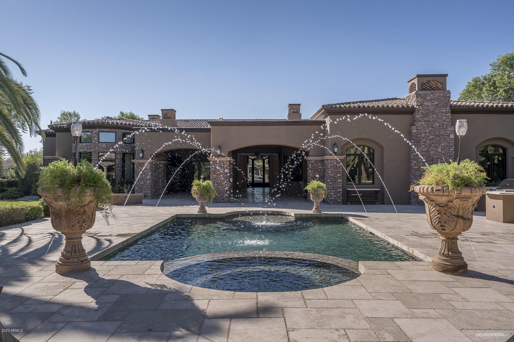 Beautiful gated Estate. Offering a Gourmet Kitchen w custom crafted cabinetry throughout,dual Islands,Sub Zeros/Wolf, wine cellar,authentic Cantera finishes,barrel ceilings,spacious family room with attached Game room/Bar area.
Spectacular view Lot and yard.