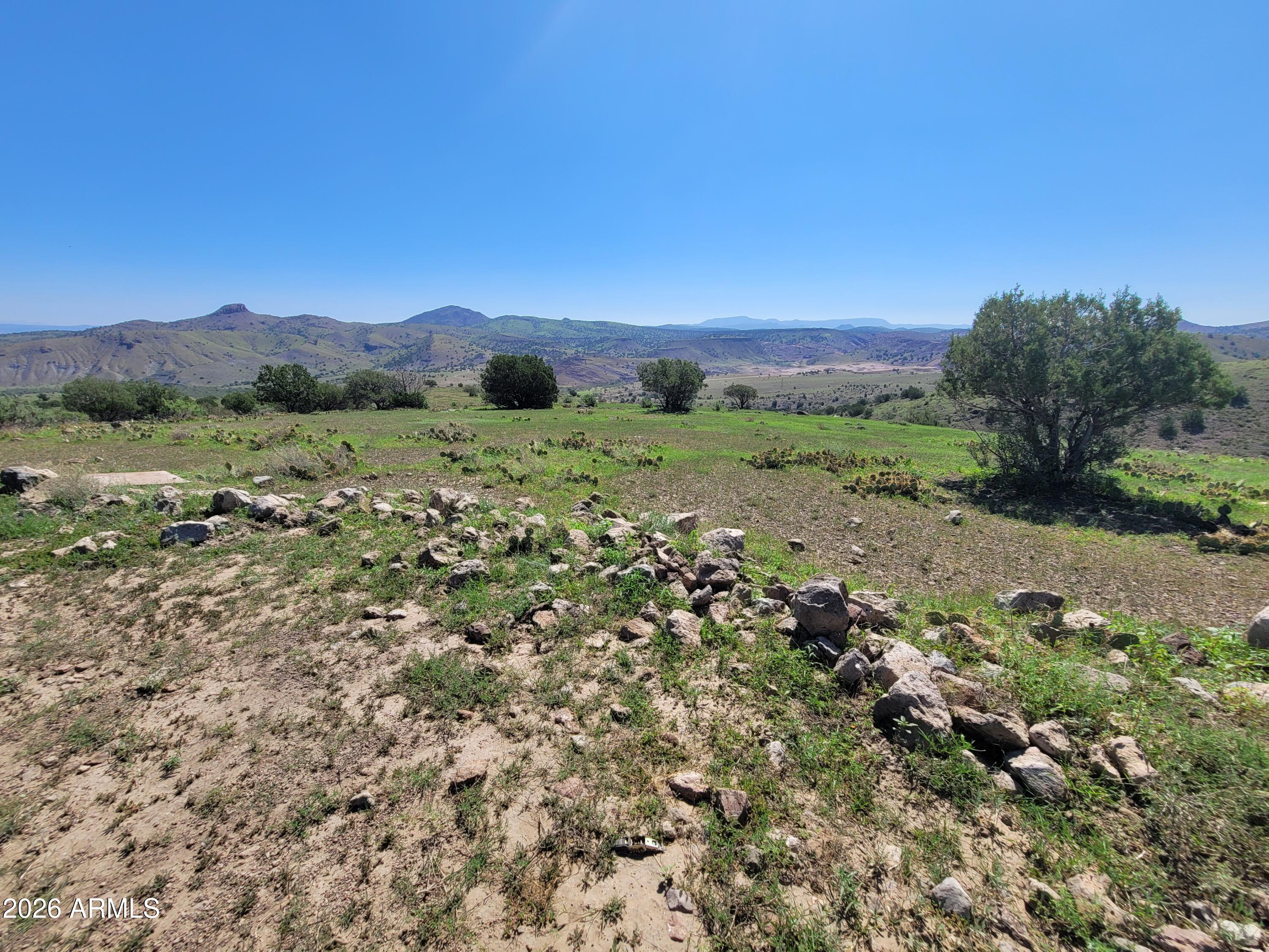 NO HOA! INCREDIBLE VIEW LOT WITH PROME LOCATION NEAR RIMROCK SUBDIVISION! Build your dream home on this exceptional view property featuring breathtaking panoramic views of Little Thumb Butte and Williams Mountain. Stunning view lots like this are becoming increasingly rare! Enjoy easy access to nature with just a short hike to the Verde River and Granite Creek -- perfect for outdoor enthusiasts who love hiking, fishing, and exploring Arizona's beautiful landscape. The property borders the desirable Rimrock Subdivision, known for its spacious 4-acre minimum ranch-style properties, offering privacy and a peaceful rural setting. Conveniently located just a short drive from everyday essentials, including Ace Hardware, Yavapai-Paulden Library, the Post Office, gas stations, Family Dollar, ..... and Safeway -- giving you the perfect blend of rural tranquility and nearby conveniences. Don't miss this opportunity to own one of the few remaining premium view lots in the area! Buyer to verify availability of utilities, water access, building requirements, and all pertinent information.