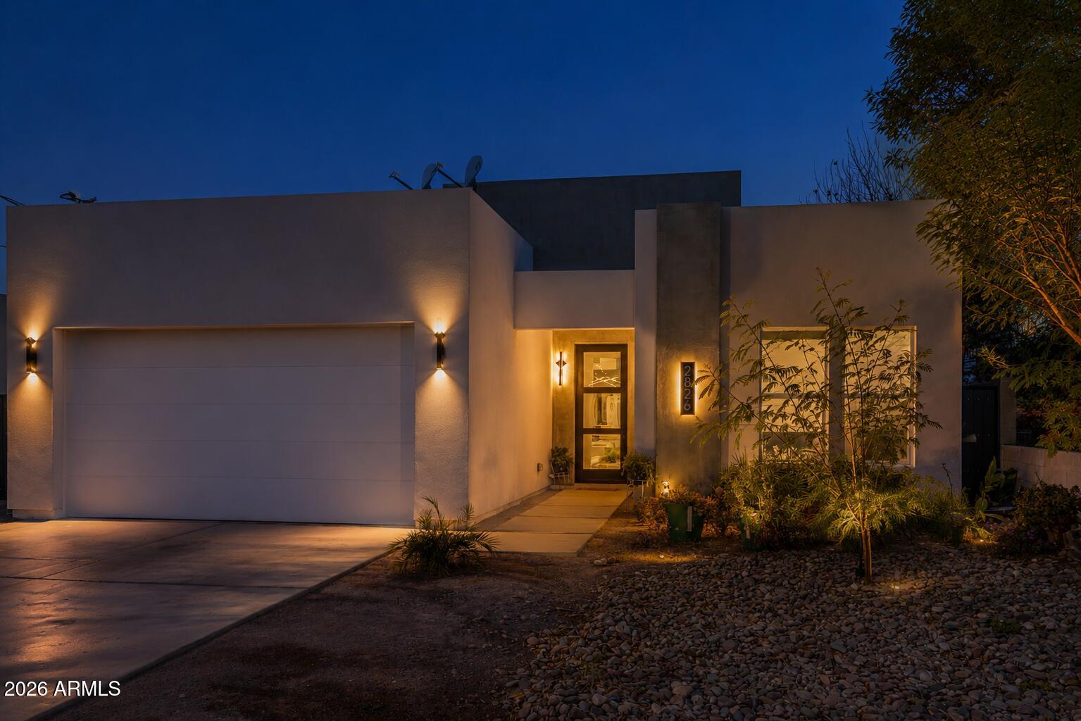 Stunning NEW CONSTRUCTION home that combines style, function, and quality! This open concept layout features a spacious great room with a cozy fireplace, perfect for gathering. The gourmet kitchen is a true highlight, with a large island, elegant custom tile backsplash, sleek quartz countertops, and high-end stainless steel appliances. Gorgeous large-format tile runs throughout the main living areas. The master suite is a true retreat, offering a spa-like bathroom with an oversized walk-in closet equipped with custom built-ins. The hall bathroom impresses with its custom tile surround, double sinks, and designer fixtures. Located in a highly sought-after neighborhood with new construction popping up all around, this home is just minutes from downtown, Biltmore, Arcadia, and Uptown.