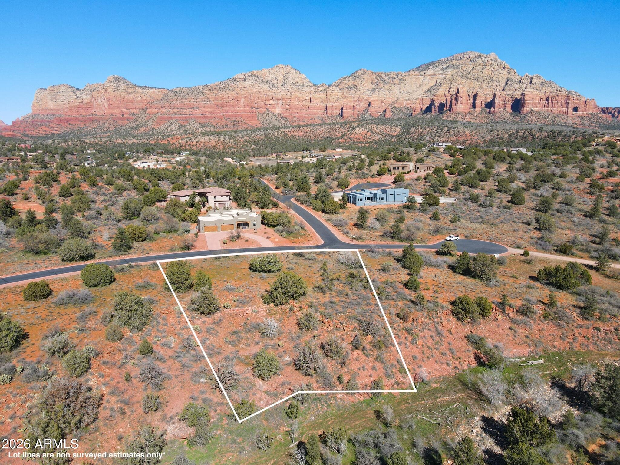 Estate-sized custom home site in an upscale gated subdivision with underground utilities. Natural arroyo and hillside behind lot provide added privacy. Minimum 2,200 sq ft build. No required timeframe to build. Buyer to verify all information.
