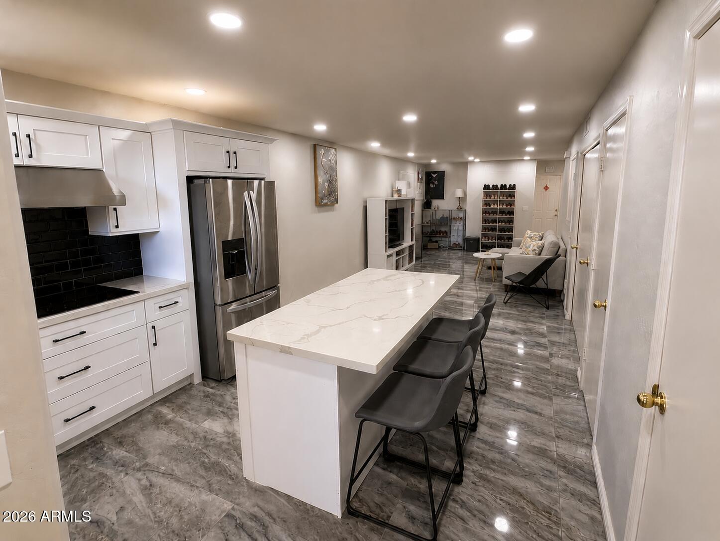 Beautifully upgraded condo in a highly convenient location near restaurants, shopping, and major freeways. This move-in-ready home features more than $30,000 in improvements completed in 2022, including updated kitchen cabinets, appliances, quartz countertops, bathroom vanities, lighting, fixtures, and flooring.

The open-concept kitchen flows seamlessly into the living area, while stylish tile flooring enhances the main level. Step outside to a charming private patio with concrete and artificial turf--an ideal space for relaxing, entertaining, or enjoying family barbecues.

The property also includes assigned parking and ample guest parking. Comfortable, updated, and ready for its next owner!
{ 2024 NEW HVAC }