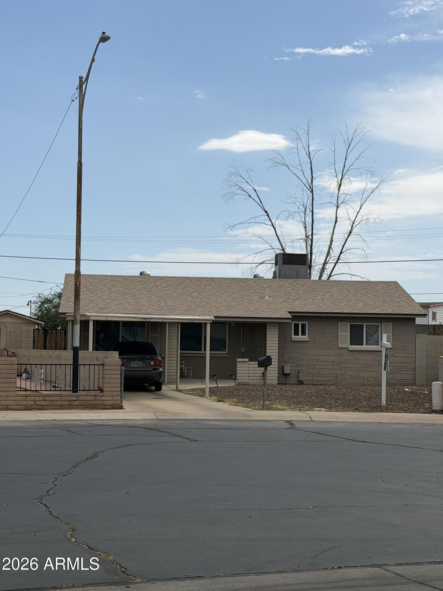 This cozy culdesac single level home, is located in the heart of El Mirage. Near plenty of restaurants, big chain stores, and family friendly parks within walking distance. The home has 3-bedroom 1 bath. Large living room, covered parking, and solid oak kitchen cabinets with dining area, indoor laundry. Large Fenced backyard perfect for family events, and with potential of a mini home. The city hosts plenty of yearly events and is known for its Grand Heritage and bright future. 
Nice affordable house with an existing building
ready to be converted into a CASITA and a 
big enough space to create your own Landscape Design and area for your Toys.