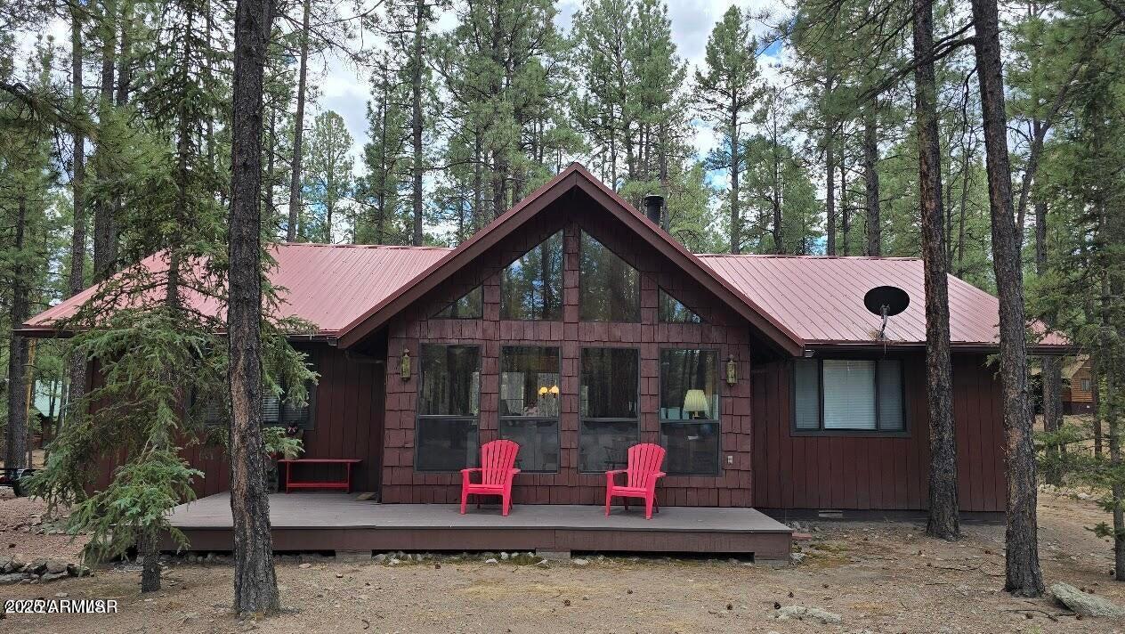 Lovely mountain cabin nestled in the trees along with decks to relax and enjoy the outdoors and mountain air. The beautiful A-frame windows provide perfect viewing from the Great Room. Detached 12x20' 1-car garage with side door and window, and power and numerous electrical outlets. New floors in kitchen and bathrooms. All appliances are new within last 2 years.