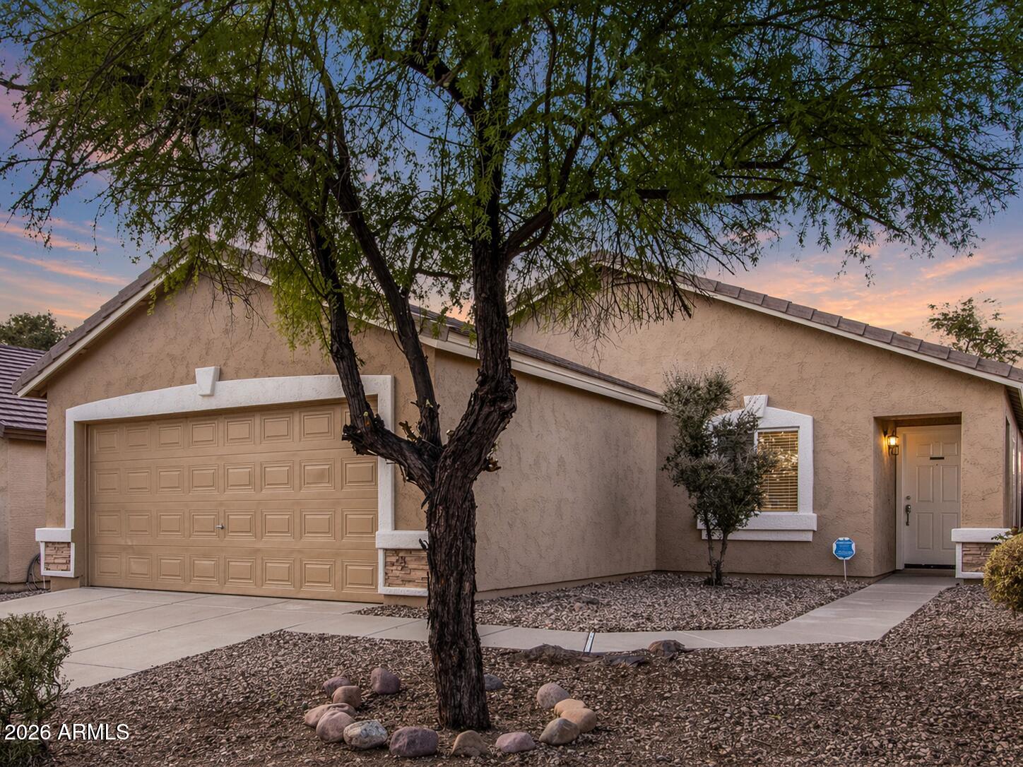 Beautifully maintained home in the sought-after Sundance community! This 3-bedroom, 2-bath home features a 2-car garage and breathtaking sunset views from a private backyard backing to a greenbelt. Designed for easy living, the open-concept floor plan showcases tile flooring in all the right places.

The eat-in kitchen is beautifully appointed with upgraded cabinetry, luxurious granite countertops, and a breakfast bar that opens to the spacious living area... perfect for everyday living and entertaining. Recent upgrades provide added peace of mind, including a new A/C unit disposal and stove in 2023, plus a brand-new dishwasher and all new carpet in 2026.

The backyard offers plenty of space to create your ideal outdoor retreat. A perfect blend of comfort, functionality, and value!