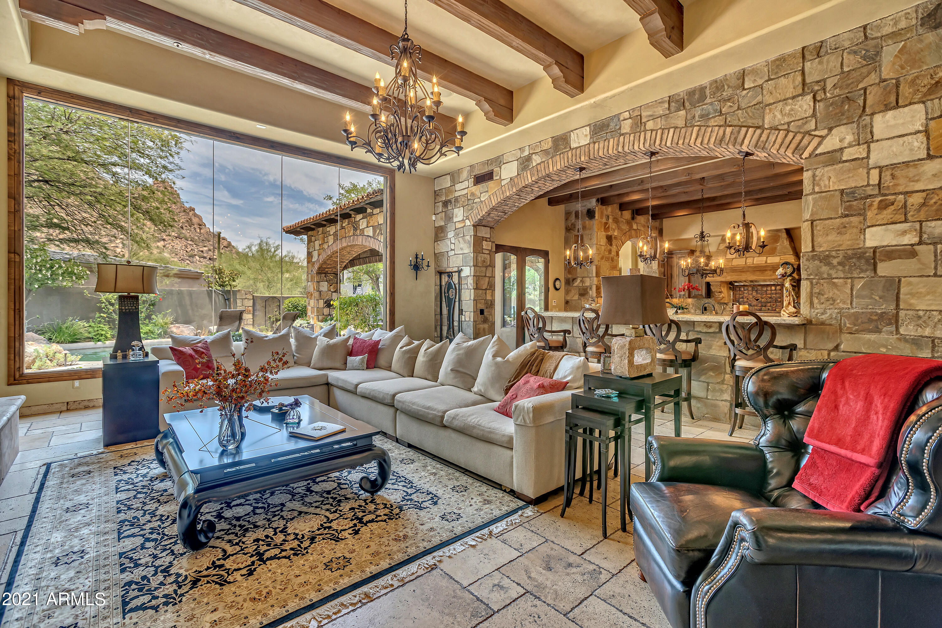 Masterpiece of design, quality craftsmanship, attention to detail & spectacular mountain views from this fabulous hillside home offering the very finest of finishes incl. venetian plaster, Turkish travertine & walnut wood floors, granite slab, extensive use of natural stone throughout, wood beams, custom closets by Classy Closets & more. Open & spacious greatroom floor plan. Grand master suite, 3 guest suites, bonus room, office + 6 car garage. Heated pebble tec pool & spa w/boulder water feature. Desert Highlands world class amenities include a Jack Nicklaus championship golf course, award winning clubhouse featuring ''Jack's'' gastropub, state of the art fitness center, Highlands Racquet Club with grass, clay and pickleball courts & more. A $95,000 membership fee due from buyer at COE.