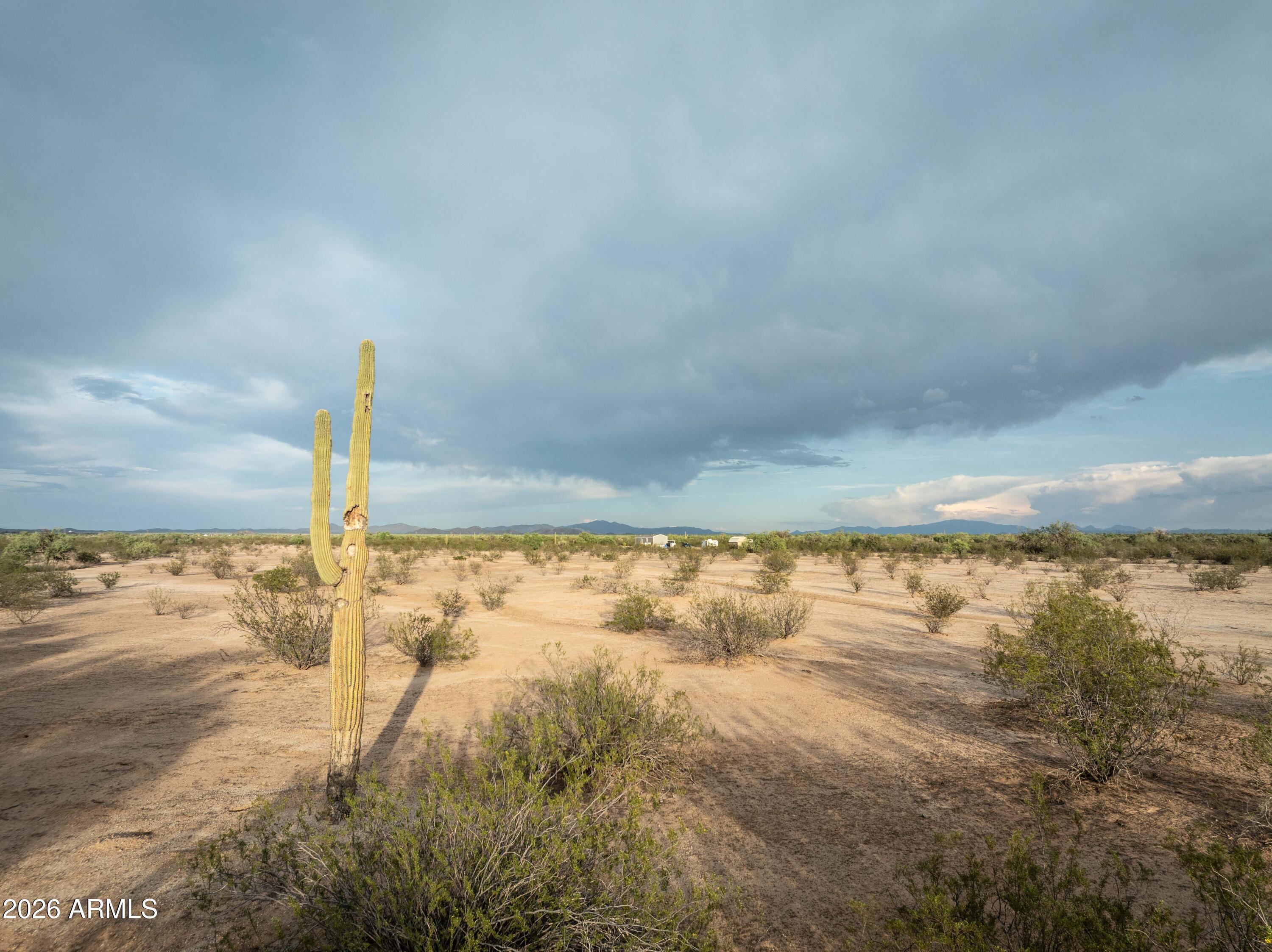 Create your off-grid dream on this expansive 14.53-acre parcel in the Florence area. Offering the ideal balance of privacy and seclusion, the property features just two nearby neighbors while providing plenty of room for a custom home, workshops, gardens, horses, or other livestock.
Located less than 2 miles via desert road from Highway 79, you'll enjoy a true off-grid retreat without being overly remote. With lot sizing that allows for a potential minor land division, this property offers exceptional flexibility for a family compound, multiple homesites, or future investment. Whether you're looking to build a self-sufficient homestead or establish a private desert escape, this land offers unmatched space and freedom.