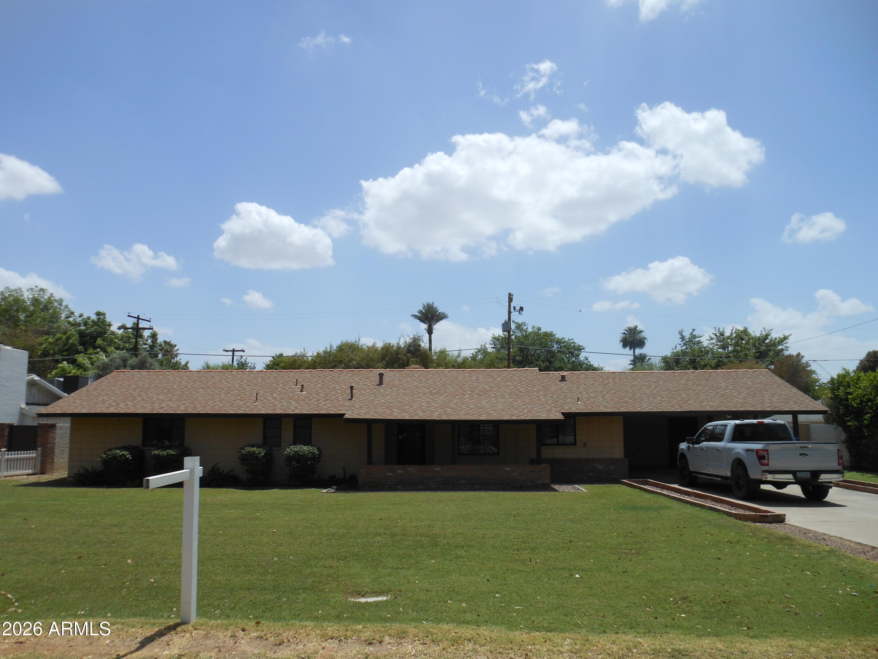 North Central home ready for a remodel! 3 bed/2bath on a large irrigated lot (14,079 sq ft).New HVAC installed 2025. 2,303 sq.ft home includes a permitted  addition. Home is being sold ''As Is''