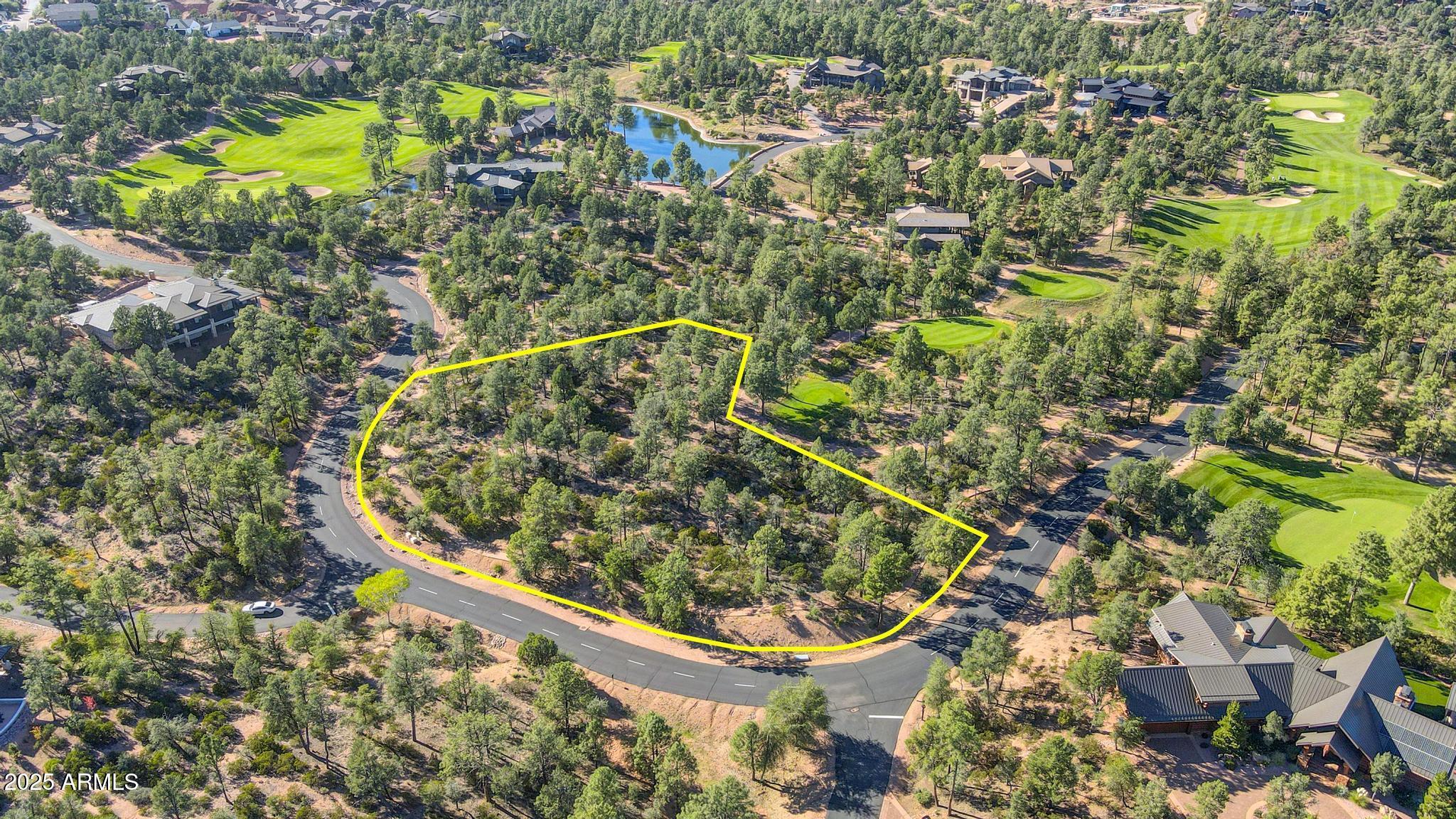 Welcome to Arizona's Finest Mountain Country Club Community, The Rim Golf Club. Check out this Spectacular 1.58 Acre Lot bordering the signature 3rd hole with Epic Views of the Golf Course and the Granite Dells. Enjoy Peace, Privacy, Ponderosa Pines and Views when you build your Modern Mountain Masterpiece up high on this Picturesque Parcel that offers a Huge Building Envelop. This Lot is suitable for an extra large Single Level Executive Home or you can add a Daylight Basement for your extended Family and Friends. Bring your own Design and Builder or work with us and Matt Sopeland Custom Homes. We have an existing Home design for this lot that will save you time and money. Please check out this Amazing Lot today. Thank You !