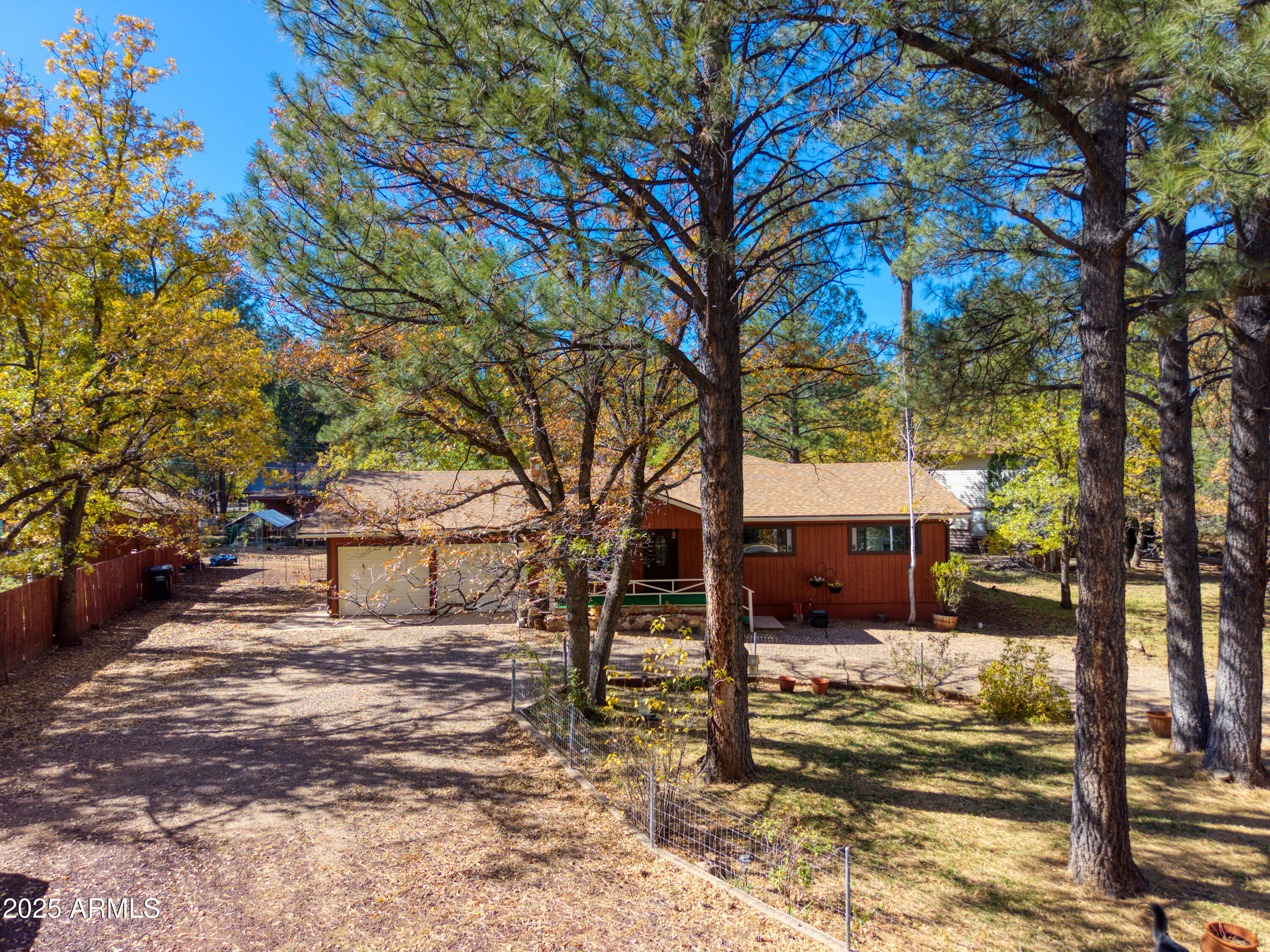 Dreaming of a home that blends charm, comfort, and upgrades? This Lakeside property has it all! Step inside to discover brand new flooring, fresh paint throughout, and beautifully refinished cabinets that give the home a bright, modern feel. The spacious living area features a fabulous stone fireplace, perfect for cozy winter evenings, and new patio doors that fill the room with natural light. The updated kitchen includes new appliances, quartz countertops, and plenty of storage for all your cooking needs. Enjoy comfortable bedrooms with new carpet and ample closet space. Outside, you'll find three separate garden areas, three chicken coops, and a detached workshop, ideal for hobbies, projects, or extra storage. The expansive backyard offers endless opportunities for entertaining, relaxing, or living the homestead lifestyle you've been dreaming of. Don't miss your chance to make this Lakeside retreat your own!