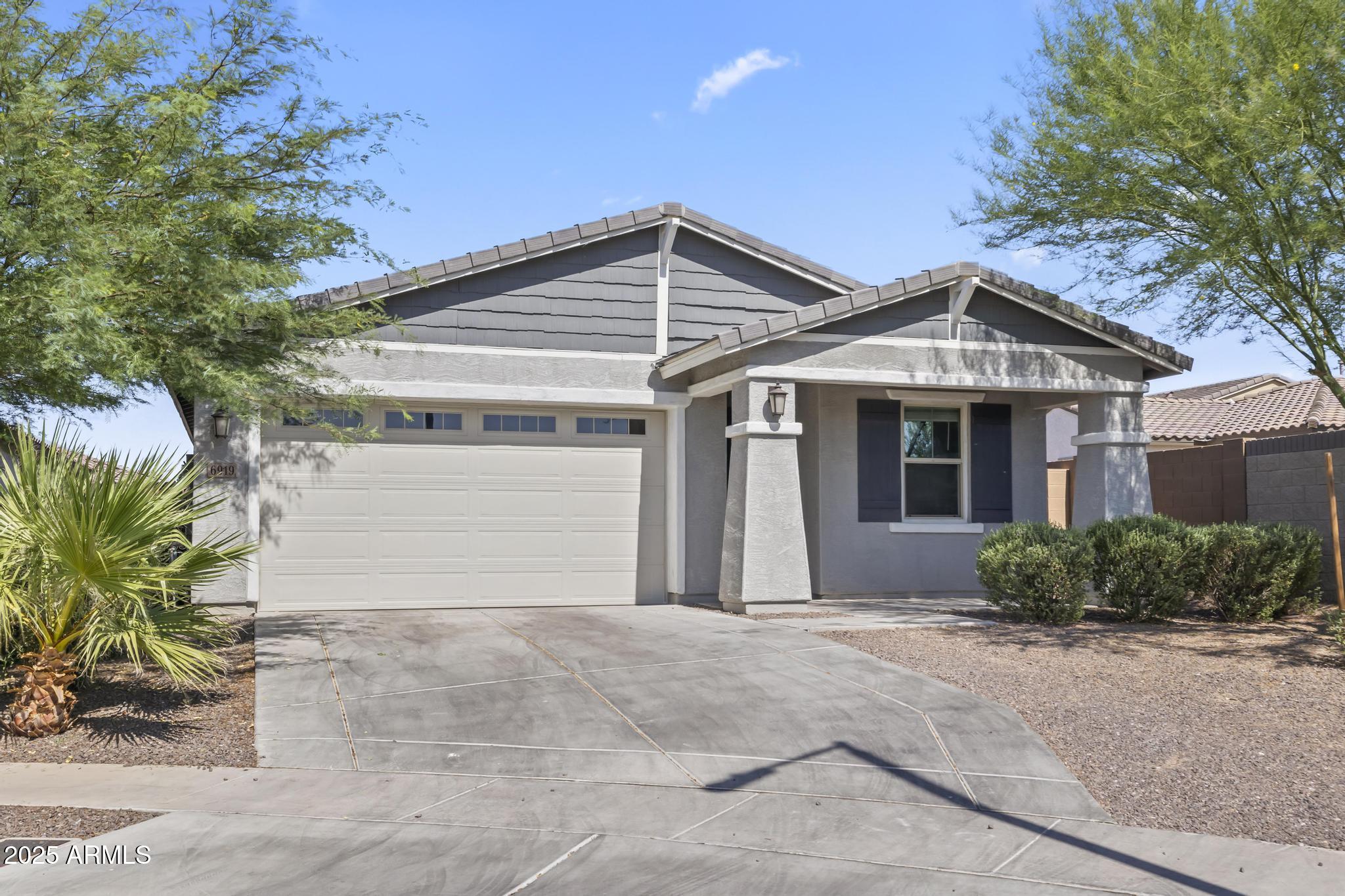 Prime cul-de-sac location sits directly across from the neighborhood playground. Welcome home to this beautifully maintained 5-bedroom, 3-bathroom gem nestled on a quiet cul-de-sac in the gated Cortona community! Built in 2020, this single-level ranch offers 1,968 sq ft of thoughtfully designed living space featuring granite countertops, a chef-inspired kitchen with island, and a spacious great room perfect for entertaining. The split master suite boasts a separate shower and soaking tub, double vanity, and walk-in closet. Enjoy peace of mind with owned solar panels and a tankless water heater keeping energy costs low. Step outside to a beautifully landscaped backyard- complete with covered patio and gazebo ideal for weekend BBQs and outdoor gatherings. Biking and walking paths just outside your door. Gated entry, 2-car garage, and low-maintenance desert landscaping round out this incredible opportunity. Don't miss it!