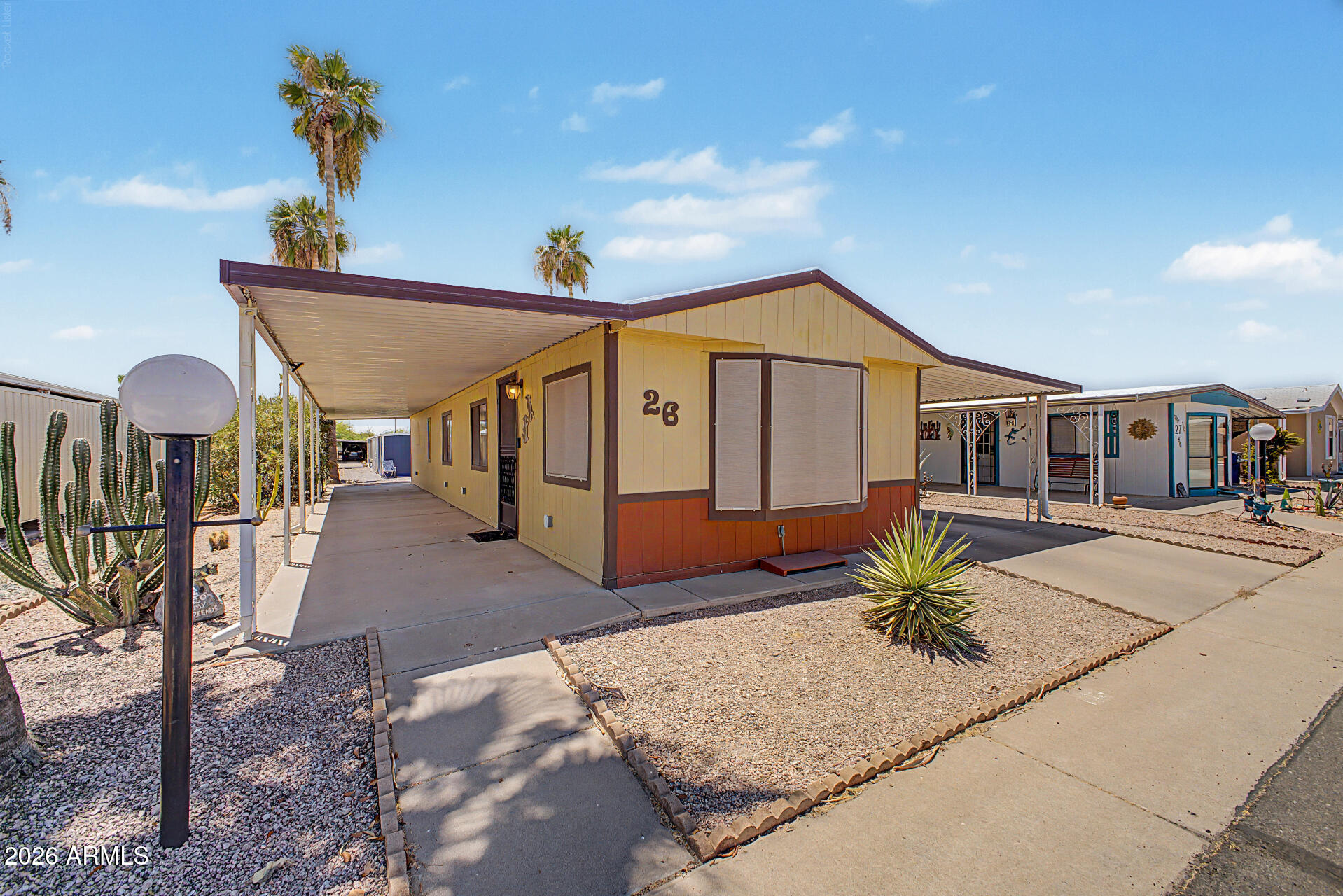 Amazing home in 55+ gated community! Enjoy the lifestyle of AJ close to the Big City! Large Great room and open kitchen with plenty of cabinets. 2 bed / 1 bath. Roof has an extended warranty that is transferrable and the A/C unit installed in 2022! Quiet & ultra-clean park w/ friendly neighbors. Wonderful amenities. See it today!