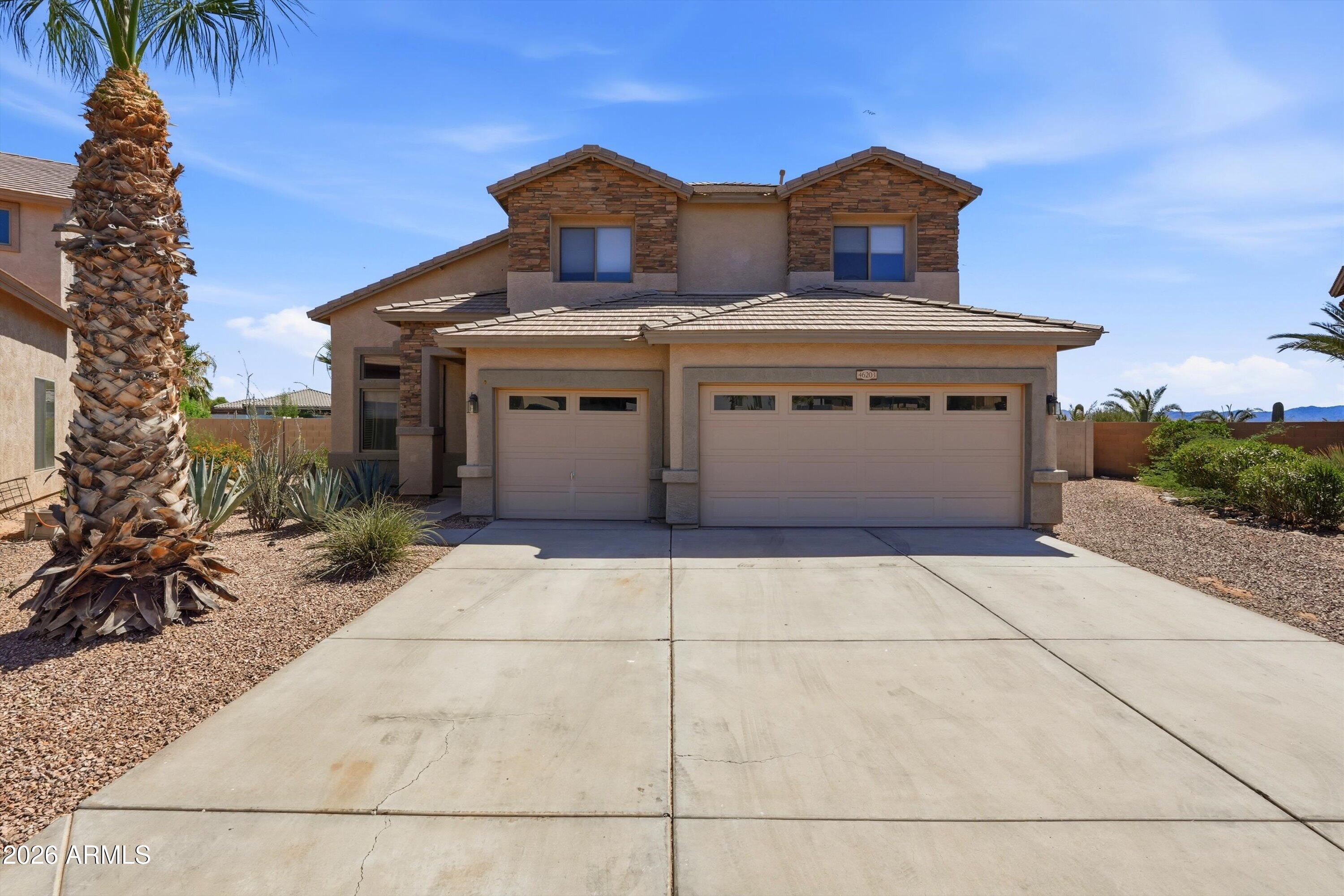 If you are looking for your own private oasis, this is the one! With over 2400 sq feet, this spacious home offers 4 bedrooms, 2.5 baths, an oversized three-car garage and main level primary suite. Step outside and you'll discover your own outdoor oasis. Designed for entertaining on every level, this resort-style backyard has it all - outdoor kitchen, heated pool with swim-up bar, spa and a waterfall! Practice your short game on the putting green or kick back and relax while you take in the beautiful sunsets and mountain views. Situated on a premium corner lot of nearly one-third of an acre, the property also features an RV gate and plenty of outdoor space. Located in a desirable Maricopa neighborhood with parks, walking paths, and convenient access to schools, shopping, and dining!