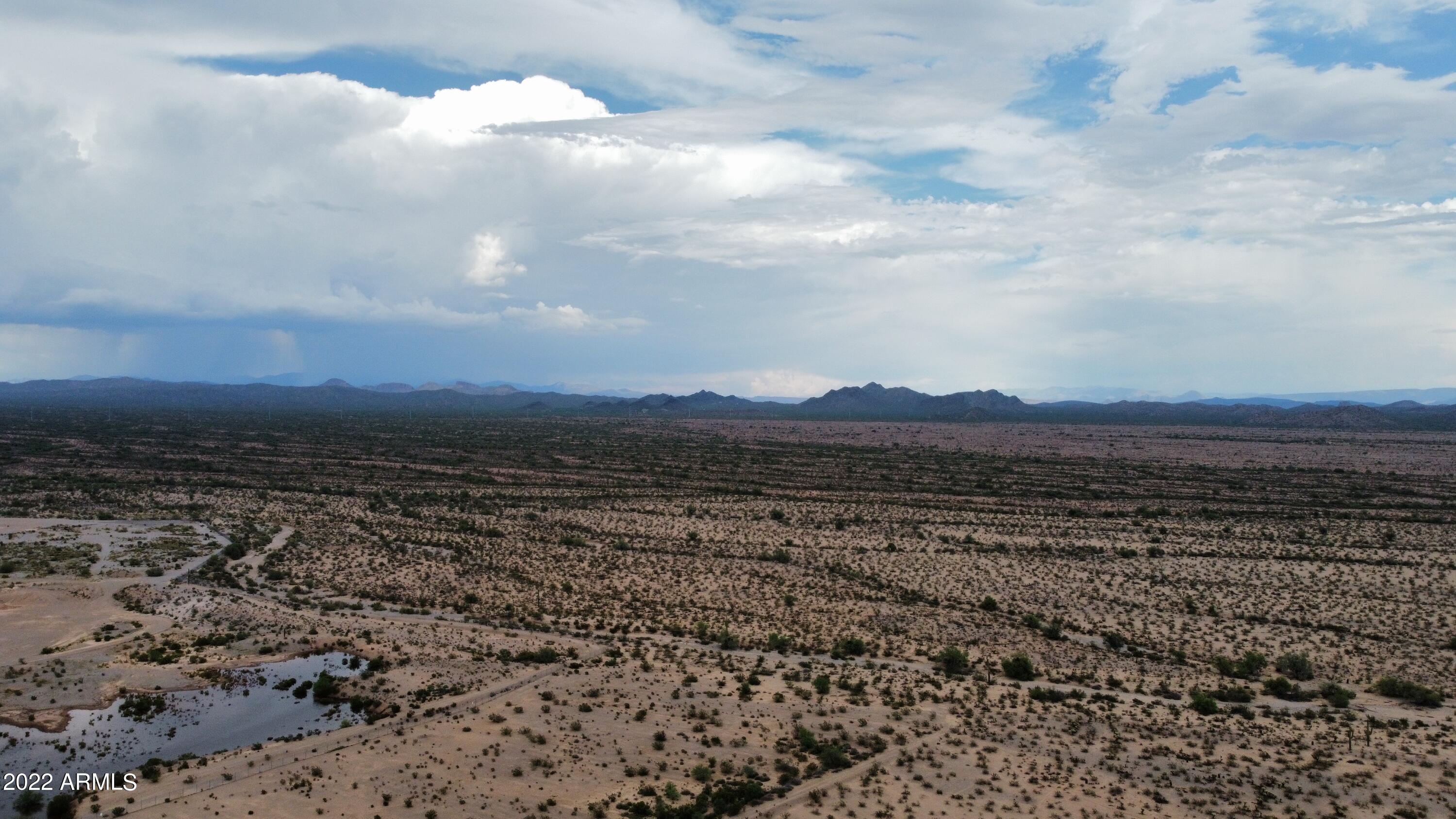 The Seller is a licensed Real Estate Agent in the state of Arizona.Seller is Agent/Owner of 0 W Dove Valley Road, Phoenix, Arizona, 85085.  This 40 acre parcel of land is a rare and valuable opportunity for commercial development, located in a prime location surrounded by Apple Inc. vast 5,500-acre 
parcel on three sides.  Situated in close proximity to the BNSF Railroad's 4,400-acre parcel , where they are building a railroad hub in 2023, this property offers endless potential for industrial, commercial, or logistic applications.
With easy access to major transportation routes, including the railroad and nearby highways, this property is ideally suited for businesses requiring logistical connectivity.  The site offers ample space for large scale operations, with room for facilities, w Property would have to be rezoned - current zoning is AG
Being located in close proximity to Apple Inc.expansive property provides an added layer of security, privacy and exclusivity.  This property offers an opportunity to establish a presence in a high-profile location. surrounded by one of the most innovative and dynamic technology companies in the world.  
This 40-acre parcel of land is a prime opportunity for those looking to establish a commercial, industrial, or logistics operation in an ideal location.  Don't miss out on this rare chance to own a piece of land in such a sought-after location.  Act now to secure your place in one of the most dynamic and rapidly growing commercial hubs in the world!