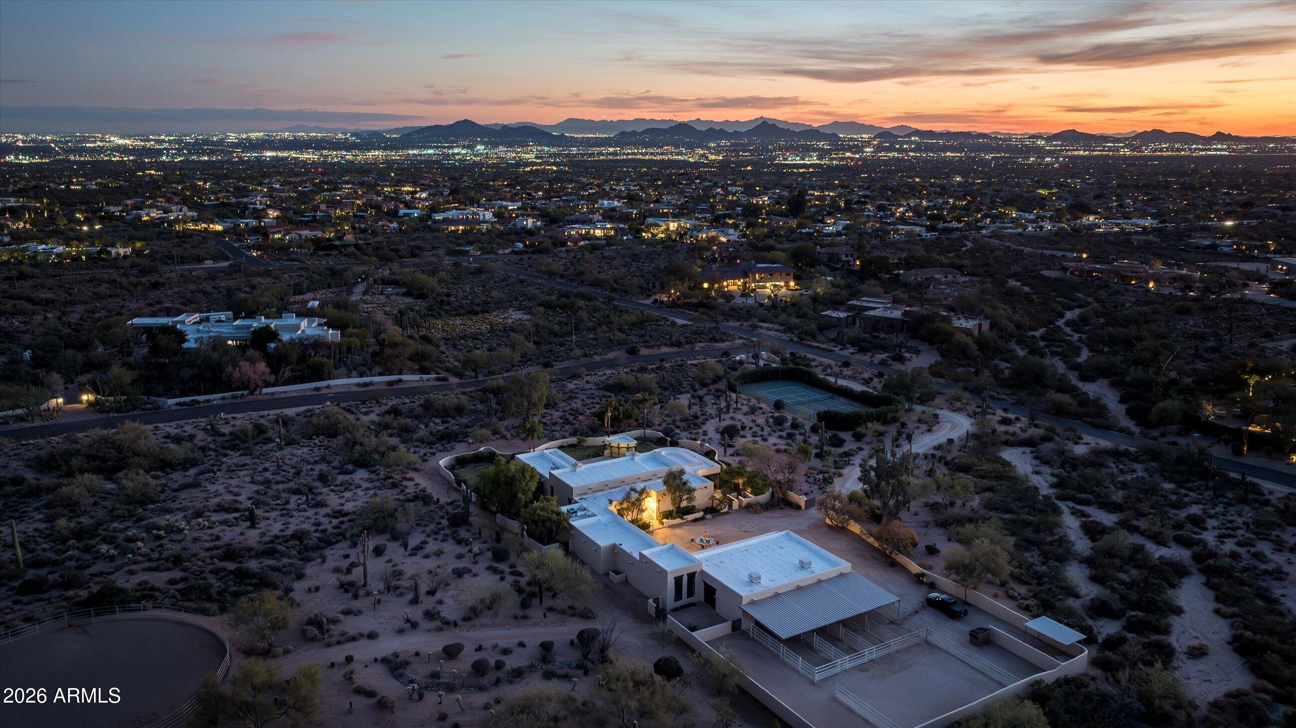 Once in a generation opportunity to own over 4 acres in the heart of North Scottsdale * Situated between Pinnacle Peak, Troon Mountain and the McDowell Mountains, the property offers an abundance of serene privacy and views in every direction * The adjacent parcel is also available for sale by the same owner of record, creating an even more incredible opportunity *