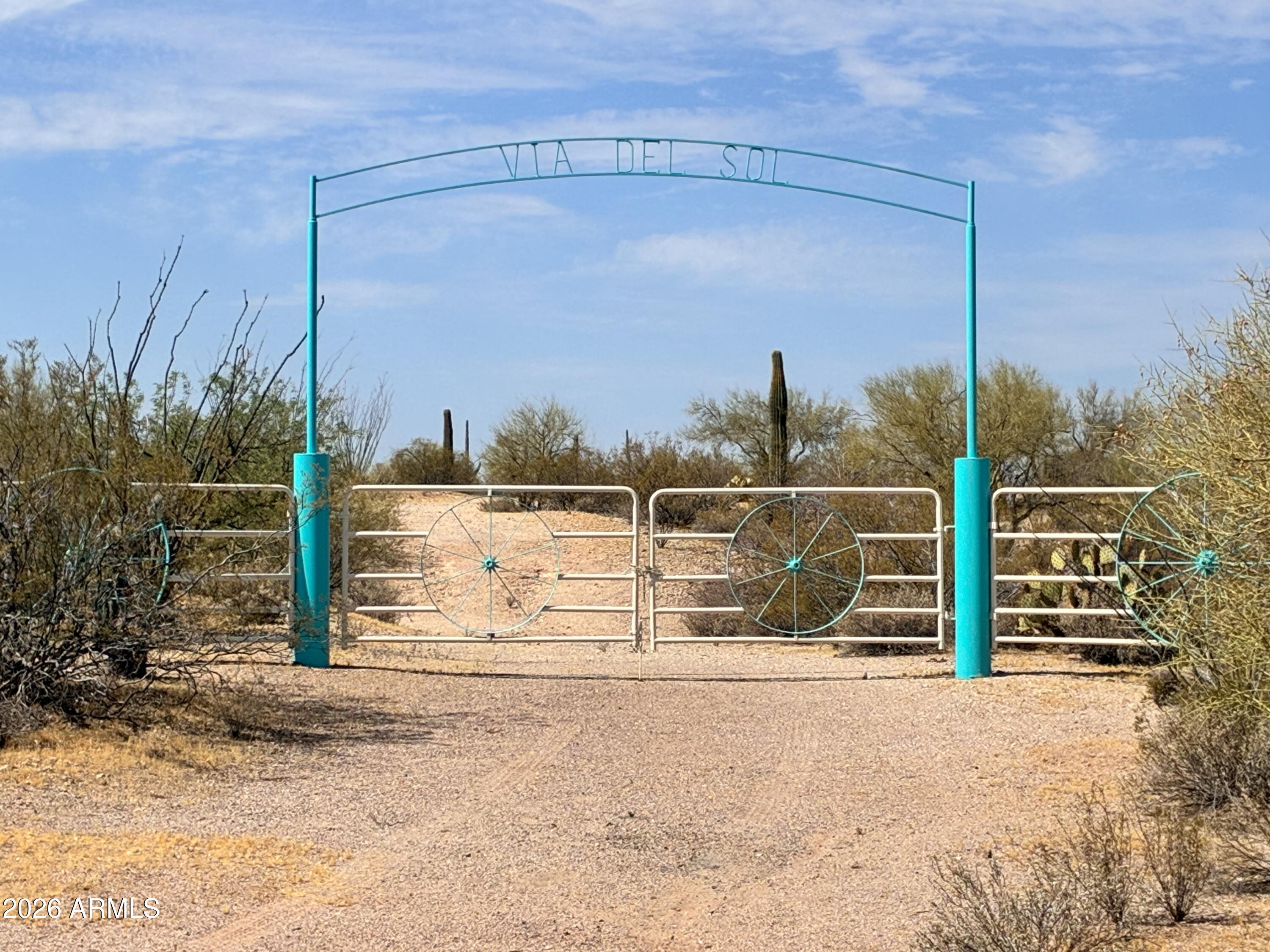 Peaceful, private, and truly off-grid, this 38-acre parcel is the perfect weekend escape or a serene location to build your permanent retreat. Enjoy 360-degree mountain views in every direction. The property features a custom gated entrance, and the private drive leads you back to a cleared area with a camper already onsite--an ideal starting point for your vision. Lot 104 is directly adjacent and also available, offering the opportunity to expand your acreage.  32.942089°N, 111.176235°W This lush and serene 38-acre property is located approximately 45 minutes from the southeast valley and 13 miles from Florence, AZ. Situated off Highway 79, it is nearly centered between Phoenix and Tucson. The land features a custom-built entrance gate and a private lane leading to a cleared site, perfect for a future ranch home.

The natural landscape is rich with giant Saguaro cacti, Palo Verde, Mesquite trees, Ocotillos, and Barrel cacti. Following the summer monsoons, the desert floor transforms each spring with vibrant blankets of wildflowers. At an elevation of 2,200 feet, the property offers stunning 360-degree views of South Mountain, the Superstitions, Pinal, and Picacho Peak.

For those seeking privacy, the property is bordered by state and federally owned land to the north and south and is located just 4 miles northeast of Saint Anthony's Greek Orthodox Monastery. The area is also a haven for local wildlife, including Desert Mule Deer, Javelina, Coyotes, Bobcats, Jackrabbits, Cottontail, Reptiles, Desert Tortoise, Roadrunners, Woodpeckers, Gambel's Quail, Elf Owls, and Harris/ Red-tailed Hawks.

This property offers significant investment potential, as it can be subdivided into smaller lots. Whether you are looking for an off-grid lifestyle, a weekend escape for horses and outdoor recreation, or a serene location for a permanent dream ranch, this land provides a picturesque retreat from the city. Additionally, the adjacent Lot 104 is available for those looking to further expand their acreage.