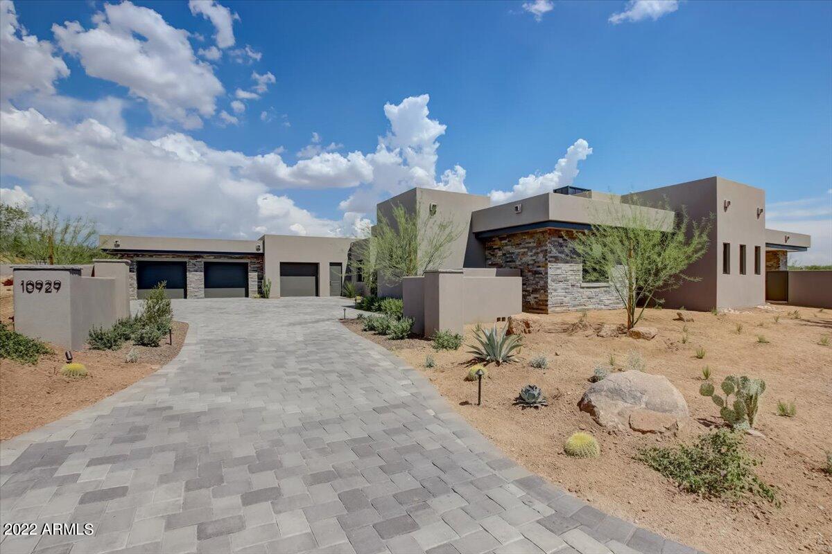 Recently Completed this Brand New TURN -KEY home located in the village of Arrowhead in the heart of Desert Mountain, boasts natural elegance and contemporary desert flair. Built in 2022, this Mortensen Signature home features over $400k in upgrades. Single-level with neutral upgraded finishes including a gourmet kitchen, light and bright great room and resort style pool with a spa. The primary suite features a large walk-in shower and soaking tub. Three additional bedrooms including a Junior primary bedroom. Expansive outdoor living spaces including the Veranda spanning across the rear patio area for optimal comfort. The Desert Mountain Club Memberships are available by application at extra cost and board approval.