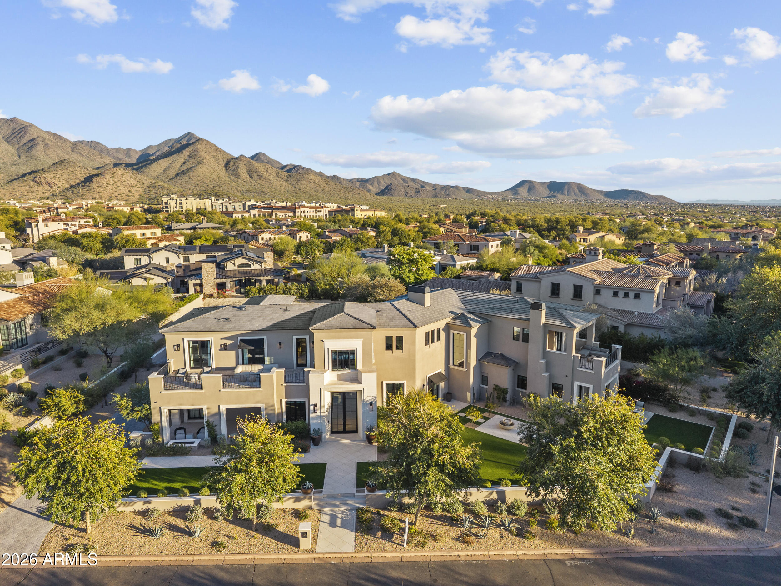 Set on a quiet street in one of North Scottsdale's most desirable enclaves, 9735 E Kemper Way offers a lifestyle defined by ease, privacy, and connection. Sunlit interiors flow effortlessly into inviting outdoor spaces designed for Arizona living—perfect for hosting, unwinding poolside, or enjoying peaceful desert mornings. The home balances refined design with everyday comfort, creating spaces that feel elevated yet welcoming. Moments from world-class golf, hiking, dining, and shopping, the neighborhood offers a rare sense of calm without sacrificing convenience. This is more than a home—it's a place where days slow down, evenings linger, and life feels intentionally well lived.