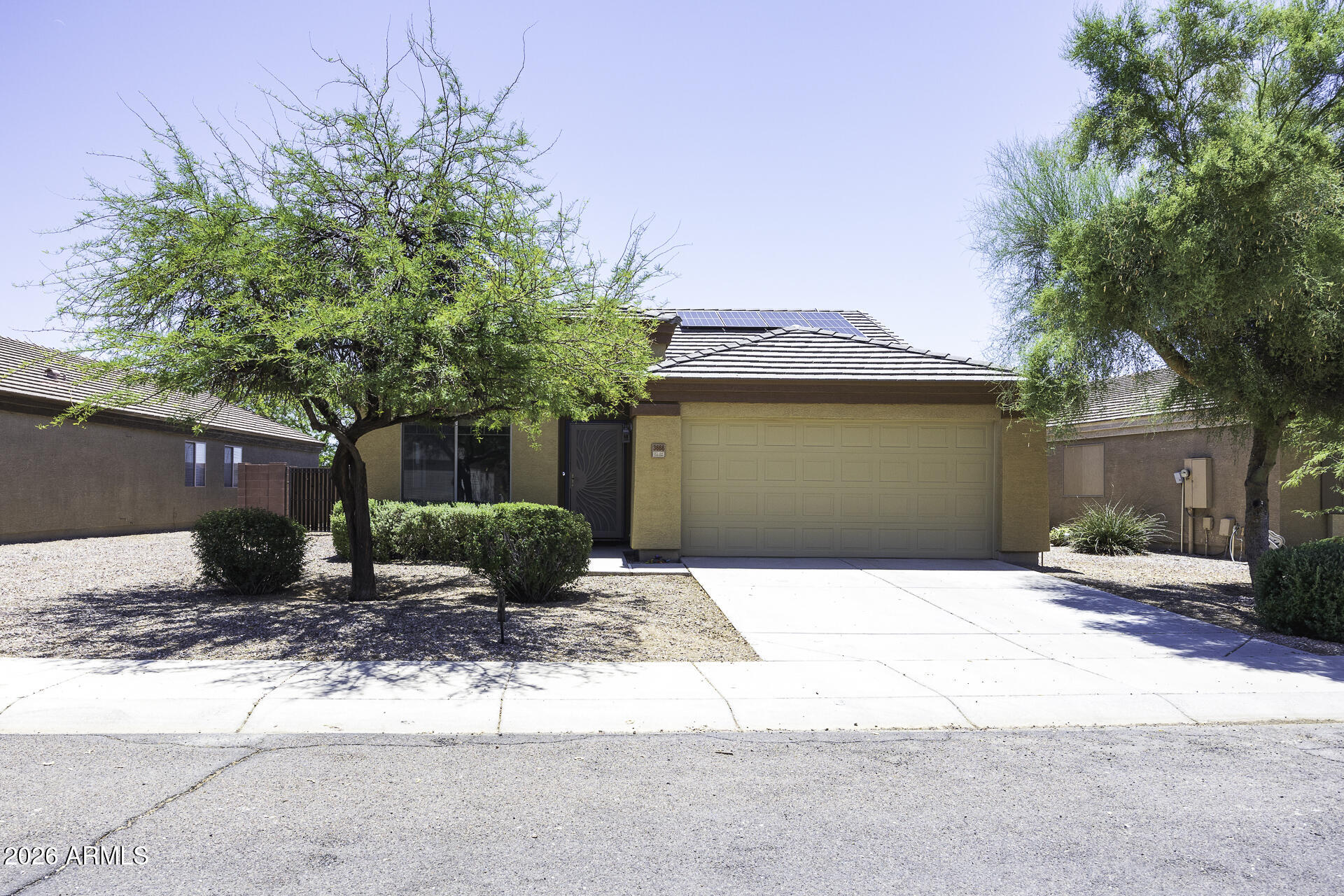 Welcome to this beautifully maintained single-story home featuring 3 bedrooms, 2 bathrooms, large family room and an ideal layout designed for comfortable living. Enjoy the benefits of solar energy, helping to reduce monthly energy costs while increasing efficiency. The private backyard offers added peace and tranquility with no rear neighbors. Conveniently located just minutes from Interstate 10, commuting to Phoenix or Tucson is a breeze. You'll also appreciate being close to grocery stores, shopping, dining, and everyday conveniences. Whether you're a first-time homebuyer, downsizing, or looking for an investment opportunity, this home offers the perfect combination of comfort, location, and value.  Come check it out for yourself!