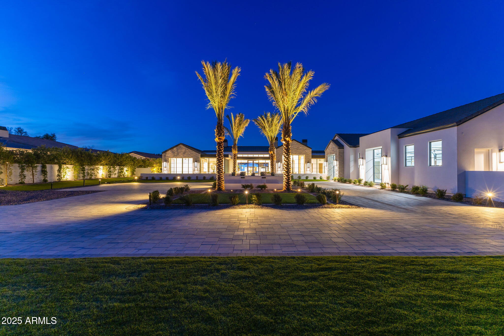 A Masterpiece of Luxury and Privacy in Paradise Valley. This brand-new custom showpiece is among Paradise Valley's most exclusive estates, crafted for those who demand sophistication, craftsmanship, and privacy. Built by Patterson Homes and designed by Grey Collective, this secluded sanctuary offers 6 bedrooms, 9 bathrooms, and 10,095 sq. ft. of impeccable living space. The chef's kitchen features quartzite countertops, Wolf and Subzero appliances, a hidden pantry, and a butler's kitchen. Additional highlights include a custom office, gym, movie theater, flex room, car carousel, and guest house/pool house. Designed for entertaining, the backyard boasts a TV wall, pool, spa, sport court, outdoor kitchen, fire features, and lounges a true luxury retreat. This brand-new custom showpiece is among Paradise Valley's most exciting and private estates, designed for those who appreciate exceptional craftsmanship, luxurious details, and a prestigious address. Built by Patterson Homes and beautifully designed and furnished by Grey Collective, this secluded sanctuary offers 6 bedrooms, 9 bathrooms, and 10,095 sq. ft. of impeccable living space, including a gym, movie theater, custom office, flex room, car carousel, and a guest house/pool house. The chef's kitchen features quartzite and marble countertops, Wolf and Subzero appliances, a hidden pantry, and a butler's kitchen. Designed for entertaining, the backyard boasts a TV wall, resort-style pool, spa, sport court, outdoor kitchen, fire features, and expansive lounges. With soaring ceilings, designer finishes, and cutting-edge technology, this estate defines luxury living at its most refined.