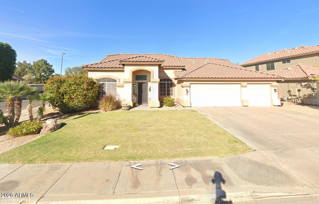 Welcome to your dream home in the highly sought-after Silverhawke neighborhood of Gilbert! This beautifully updated single-story residence sits on a premium corner lot and features 4 bedrooms, 2 bathrooms, a versatile den, and vaulted ceilings that create a bright, open, and airy feel throughout. Recent major updates include a brand-new roof (only 3 years old) and a fresh exterior paint job, giving the home fantastic curb appeal and peace of mind for years to come. The main garage door has also been recently replaced. Inside, you'll find an impeccably clean interior with excellent natural light thanks to the desirable North/South exposure. Step outside to enjoy lush green grass in both the front and backyard -- perfect for outdoor entertaining and gatherings. The spacious 3-car garage (split 2+1 configuration) offers great flexibility for parking, storage, or hobbies. Located in one of Gilbert's most convenient areas, you're close to top-rated schools, shopping, dining, parks, and easy freeway access. This move-in ready home perfectly balances comfort, updates, and location. Don't miss this rare opportunity in Silverhawke.
