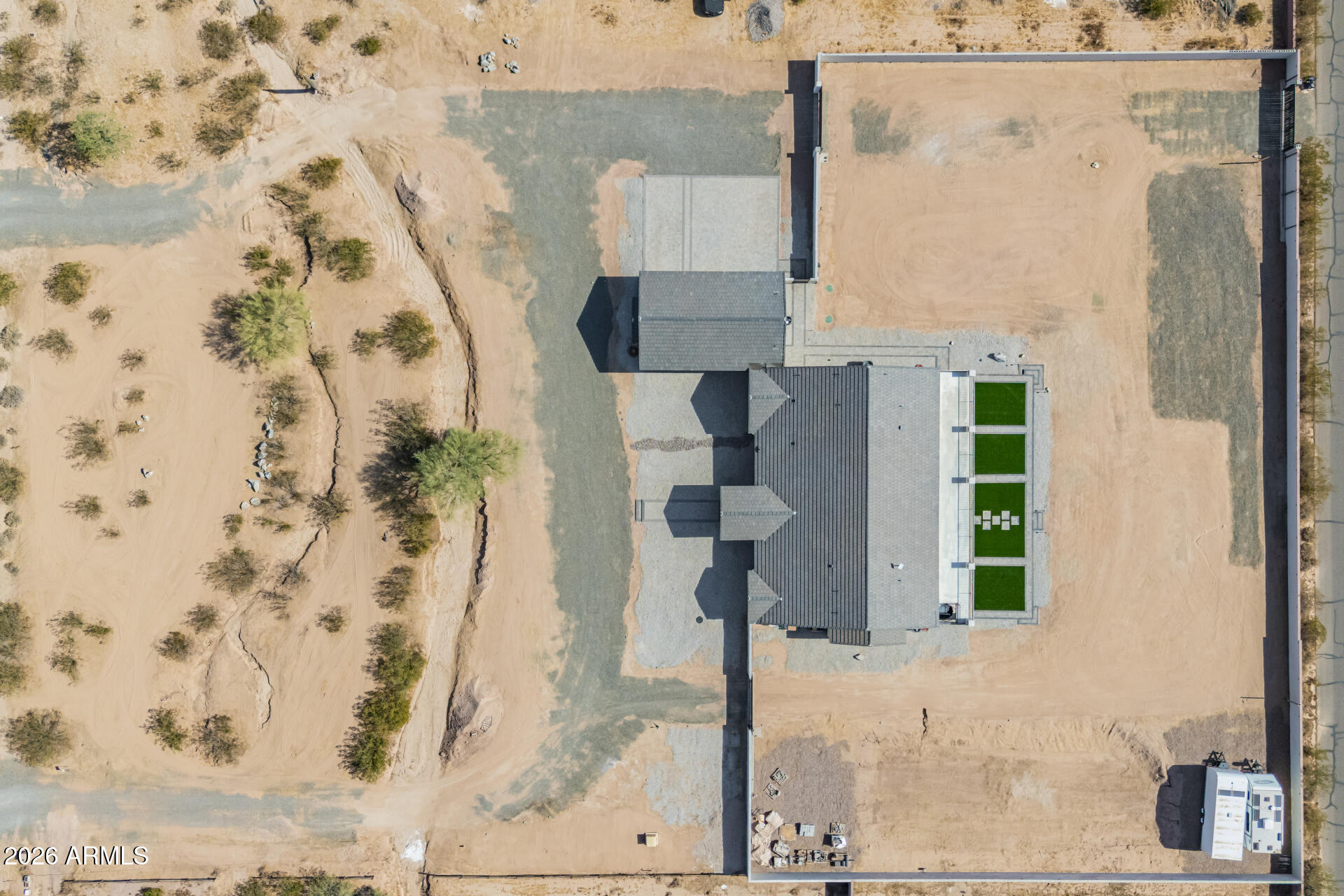 Luxury Custom New Build in Casa Grande!
 
Welcome to 8236 Calle Hermosa, nestled on a HUGE 2.013 -acre lot in Los Montanas this stunning fully custom-built home offers over 5,500 square feet of thoughtfully designed space. Set back 180 feet from the road offers you incredible privacy This exceptional residence features 6 spacious bedrooms, 4 beautifully appointed bathrooms, and a floor plan that perfectly blends luxury, comfort, and functionality.
From the moment you step inside, you'll appreciate the attention to detail, quality craftsmanship, and modern finishes throughout. The expansive open-concept design creates the perfect setting for entertaining, while the gourmet kitchen serves as the heart of the home with custom bespoke cabinetry, bespoke appliances, premium finishes, abundant workspace, butler-style pantry w/beverage center and designer touches throughout.
 
The spacious, seamlessly flowing open layout is sure to impress! The inviting living area is paired with an electric fireplace capable of providing 600SQFT of cozy comfort, Dolby Surround sound and multi-sliding doors that open to your own luxury patio area with over 1100 SQFT of covered space.
 
The generous primary suite provides a private retreat complete with a spa-inspired bathroom and a luxury walk-in closet with custom designer-built organization system. With five additional bedrooms each offering flexibility for guests, a home office, fitness room, a media room or multigenerational living all with custom-designed multi-tier closet systems.
 
Car enthusiasts, hobbyists, and those needing extra workspace will love the more than 1000SQFT fully insulated climate controlled garage, providing year-round comfort and versatility . Comes with an additional Laundry area utility sink and 240 volt plug in for whether you want to run a welder or just plug in your electric cars.
 
Situated on a desirable lot in Casa Grande, this one-of-a-kind custom home delivers the perfect combination of elegance and everyday practicality. With over 3,300 square feet of living space, there is room for everyone to spread out and enjoy.
 
Additional Outdoor Living & Property Features:
 
Step outside and experience true Arizona living at its finest. You'll love the 12 foot custom spiral staircase that's takes you to the private observation deck that fully sweeps the entirety of the back of the home, the perfect place to unwind while taking in breathtaking city views and spectacular Arizona sunsets. The expansive backyard offers endless opportunities for entertaining, featuring an oversized covered patio, beautifully laid pavers, and low-maintenance artificial turf providing you with more than double the entertaining space. With ample room to add a custom pool, the outdoor space can easily be transformed into the ultimate resort-style retreat.
 
Designed with both luxury and functionality in mind, this property also features three oversized RV gates, its own private entrance to the community from Bel Air,  providing convenient access to all sides of the home. The spacious 3-car garage and elegant paver driveway offer plenty of room for vehicles, recreational toys, and additional storage. Every detail has been thoughtfully planned to maximize comfort, convenience, and versatility.
 
This exceptional custom estate is a rare opportunity to own a one-of-a-kind property that perfectly combines luxury living, stunning views, and abundant space both inside and out. This beauty truly won't disappoint! What a rare find!
 
Don't miss the opportunity to own this extraordinary custom home where quality construction, modern design, and spacious living come together beautifully.
 
8236 Calle Hermosa - Custom Luxury Living at Its Finest.
 
The home is feature packed so please look on documents tab to the full list of amenities.
State of the Art Media installation Multi Zone and 8K capable. Enjoy Dolby Atmos in the Theater Room and hear Movies like never before. Whether you're just watching tv or  entertaining for many the system is pre installed giving you no exterior wiring or speakers to worry about. The Patio is equipped with in Ceiling 10 Inch speakers that span the entirety of the patio space. The home is prerun and wired to everyone for Coaxial and Gigabit Ethernet.