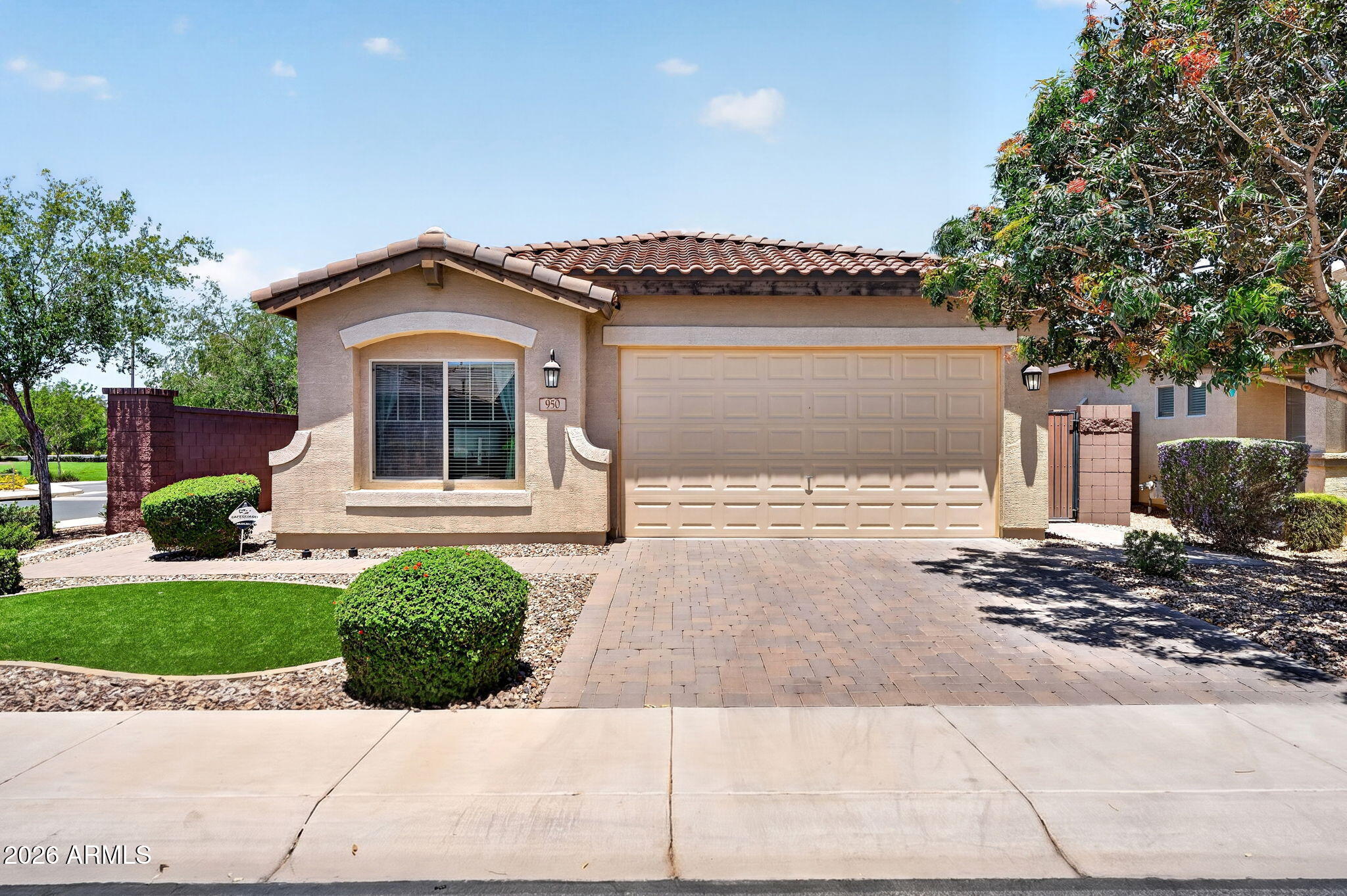 Welcome home to this beautifully maintained 4- true bedroom, 2-bath gem in highly sought-after Ironwood Crossing! Situated on a prime corner lot directly across from a playground and expansive green space, this move-in ready home offers 1,671 Sq Ft of bright, open living space featuring a granite kitchen, tile throughout all main spaces, surround sound, and water softener. The open floor plan creates a warm, inviting feel perfect for everyday living and entertaining. Enjoy a low-maintenance backyard with covered patio, and extended pavers plus a 2-car garage. Washer/Dryer/Refrige convey! Community amenities are what makes living here special. Pools, splash pad, sport courts and a disc golf course provide built in outdoor fun! Plus it's walking distance to a highly rated charter school! Ironwood Crossing is a master planned community built by Fulton Homes, one of Arizona's premier builders. It offers vibrant resort style living with tons of amenities, green spaces and playgrounds throughout the community. Topping it all off is Legacy Elementary School, the A rated charter school, located right near the Fulton Aquatic Center.  Ironwood Crossing is truly a quality of life place to live, learn, and play! Don't miss this opportunity to make this home yours!