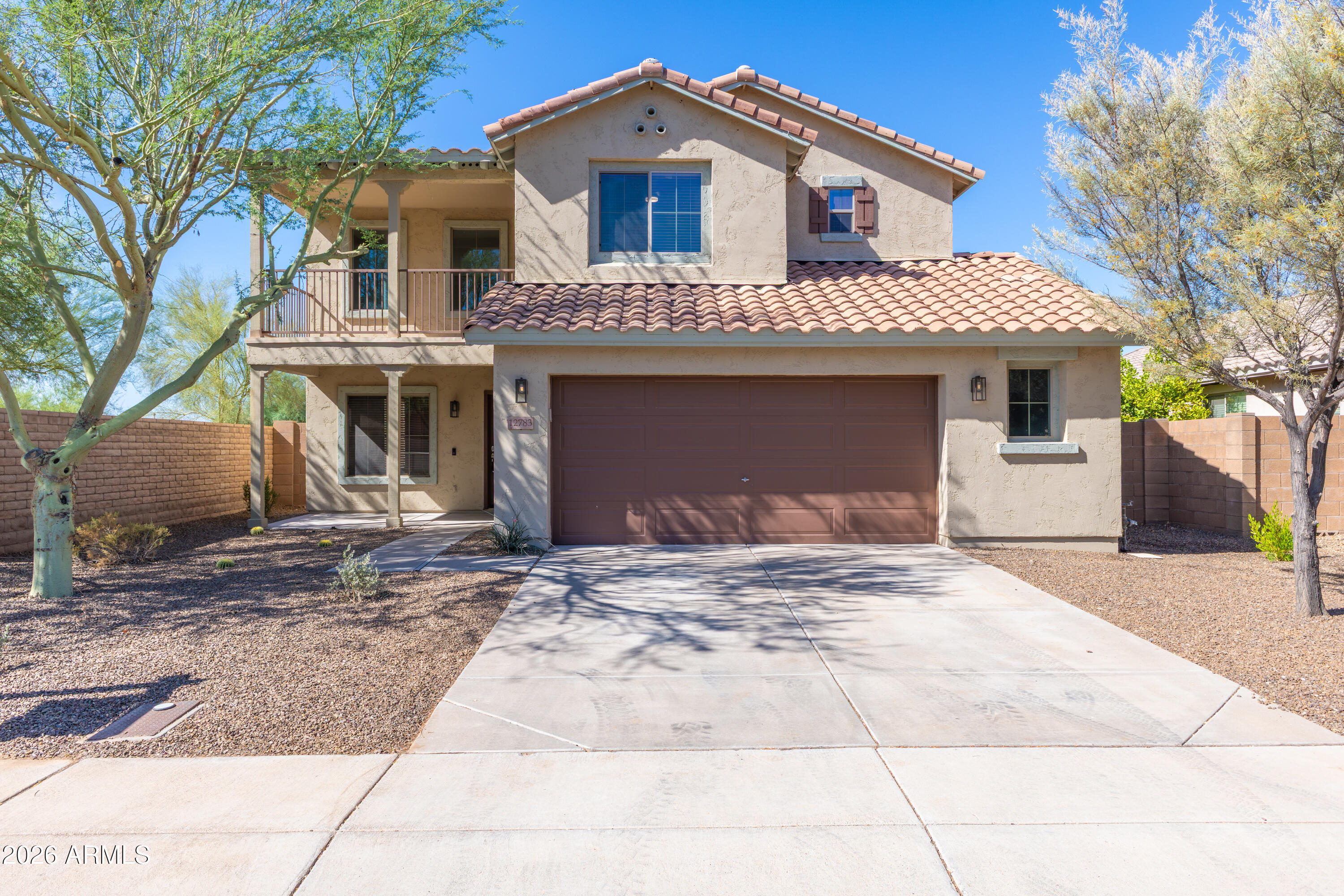 Live in beautiful Vistancia, in this 4 bedroom, 3 bath 2.5 car garage home on a premium location that backs & sides to common area. Enjoy mountain views from the balcony. Spacious living / dining room with vaulted ceiling. The kitchen is loaded w/rich cherry cabinets, stainless appliances, walk-in pantry, easy care tile floor, opens to the family room with an entertainment media wall. Ceiling fans T/O.  2024 UPGRADES: HVAC, all LED lighting, bath lighting, ceiling fans, cabinet & door hardware.  2023: new interior paint & carpet. 2022 new exterior paint. Includes Fidelity Comprehensive Plus Home Warranty. COMMUNITY AMENITIES: Clubhouse, Aquatic Center, Pools, Splash Pad, Water Slides, Tennis & Pickle Ball, Numerous Classes & Clubs, Newsletters & much more! Buyer to verify school info. Buyer / Buyers Agent to verify school info if important to buyer