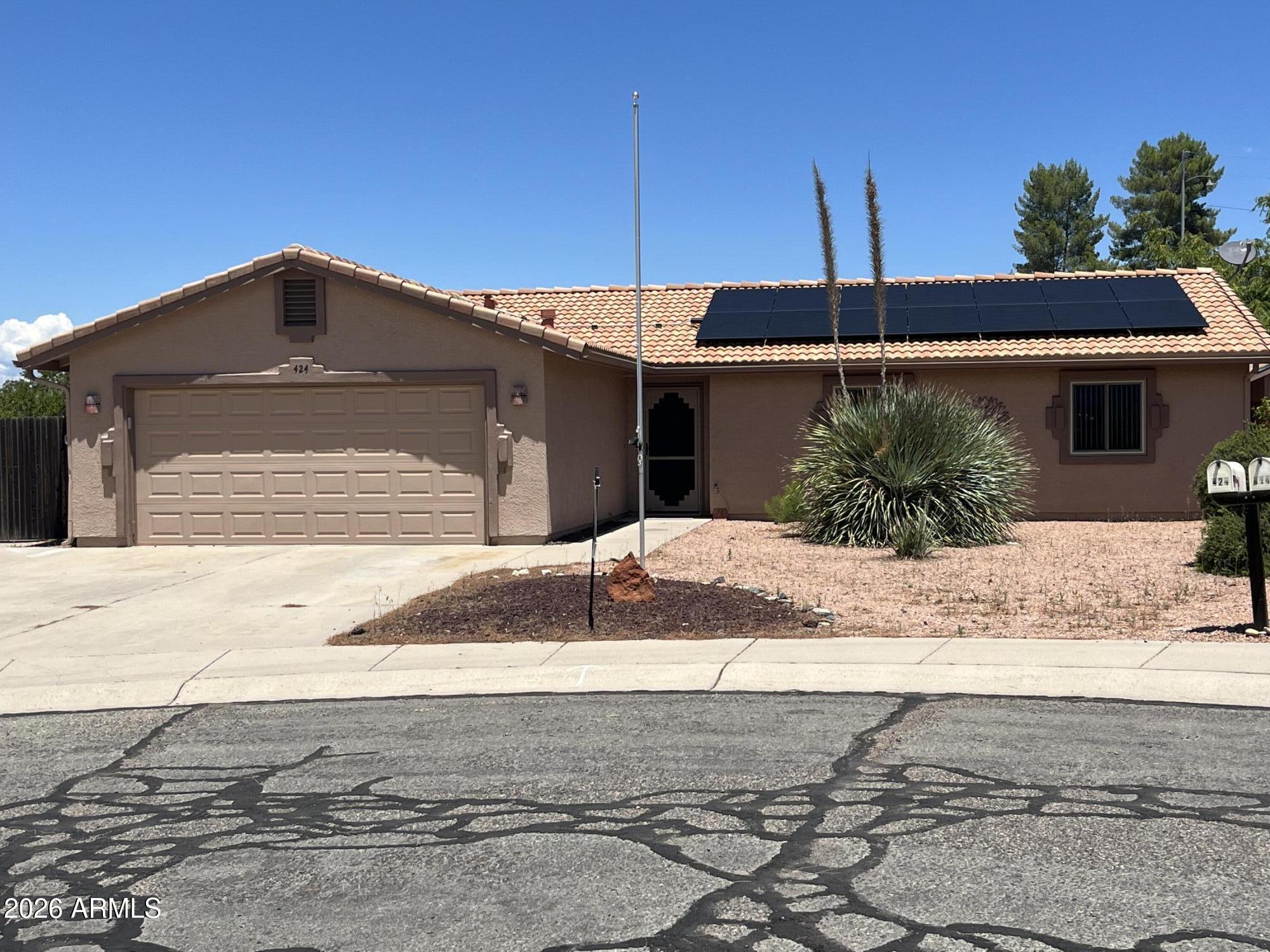 Great Location in the heart of Camp Verde, close to amenities, great area, cul-de-sac, very well kept home, spacious 3 bedroom, 1 3/4 bath, 1382 sq. ft., open floor plan, HVAC (natural gas furnace/central air), newer windows, kitchen has granite counters, Master bedroom has 2 walk in closets, master bath has been updated with walk in shower, screened in patio off living room, ceiling fans throughout, 2 car garage with lots of shelving, utility shed with electricity, rose arbor on side yard, large driveway for parking, low maintenance landscaping, Tile roof, appliances are refrigerator, stove, built in microwave, D/W, R/O, water softener, washer, dryer,  great barbecue, solar lease paid in full for energy savings. No HOA. great opportunity to own a great home in a very convenient location.