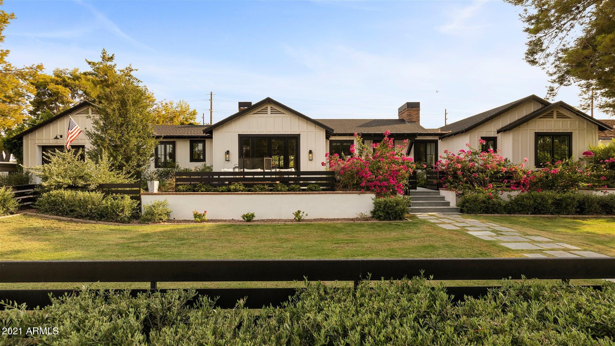 This outstanding craftsman cottage is walking distance from Hopi Elementary and is absolutely impeccable. At nearly 5,000 square feet, the floor plan offers exceptional space for daily family living, yet it's perfectly planned for large scale entertaining. Two separate great rooms and two offices provide lots of room for a growing family and working from home as well. Each bedroom has its own bath and walk-in closet with direct access to the pool, and the cutting-edge finishes include gorgeous real wood flooring, artistic tile, impeccable marble surfaces, impressive lighting, top of the line appliances, and intricate high end millwork. It's overflowing with quality and character, and room after room has flawless taste and faultless design. The newly designed backyard is totally dialed in.. with a brand new heated pool with oversized spa, gazebo, baja pad, custom barbecue island, outdoor shower, resort style chess set and artificial turf. The home is only 2 years old with a 3 car garage and $250,000 of new upgrades made in the last year including custom fencing and new landscaping. This beautiful residence is lacking nothing. The vibe is fresh, the elegance is classic, the beauty is endless, and the environment epitomizes the charm and intense style that makes Arcadia so special!